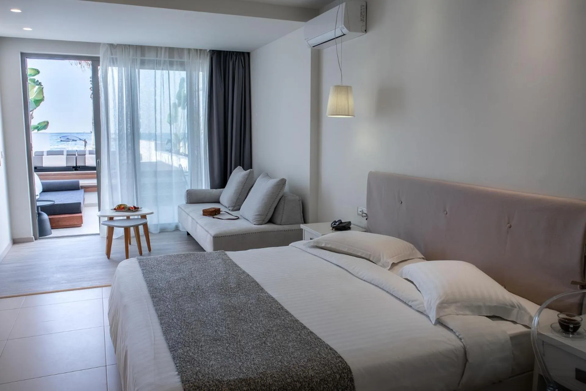 Bed in Iperion Beach Hotel