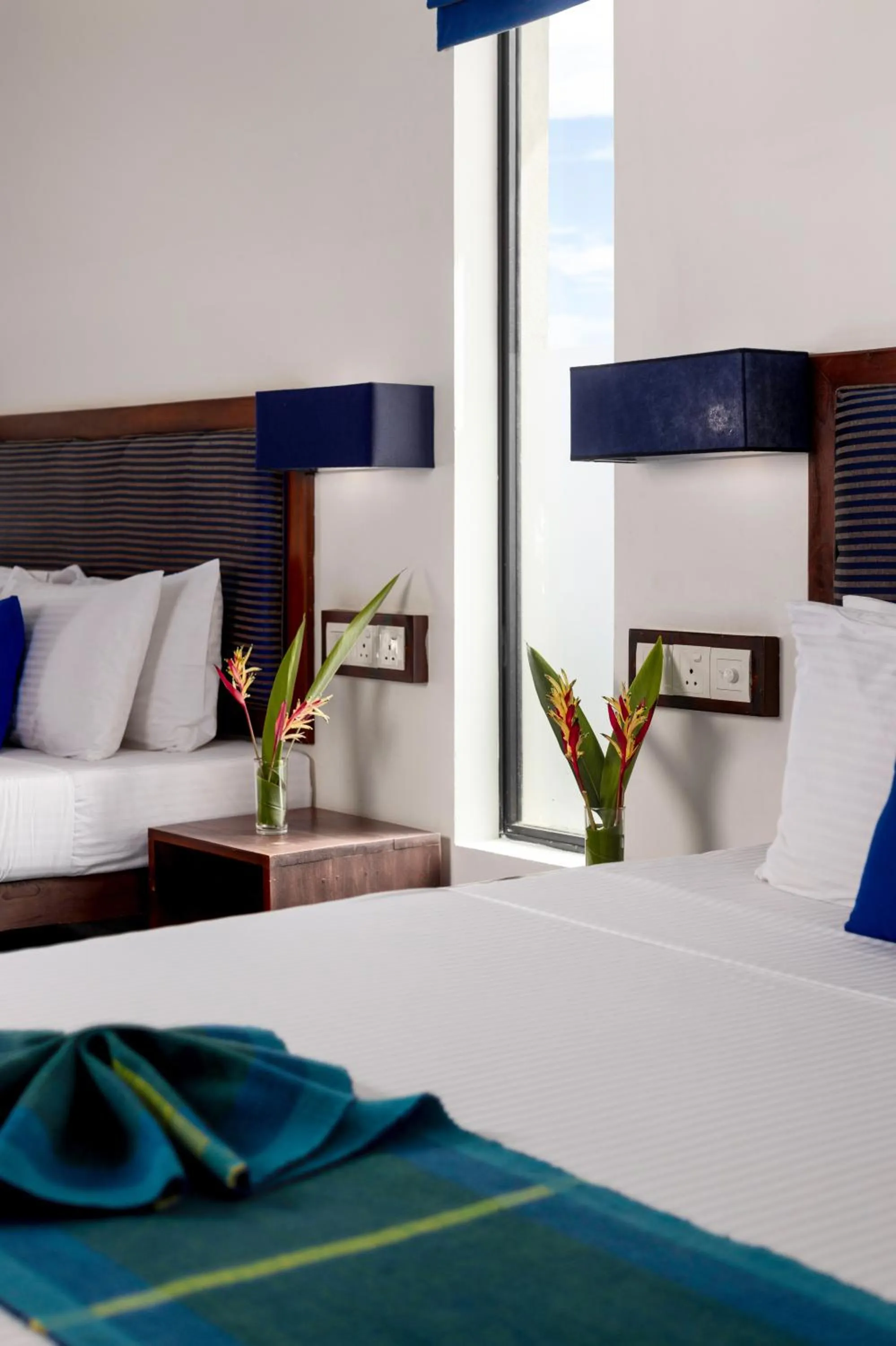 Bed in The Blue Wave Hotel