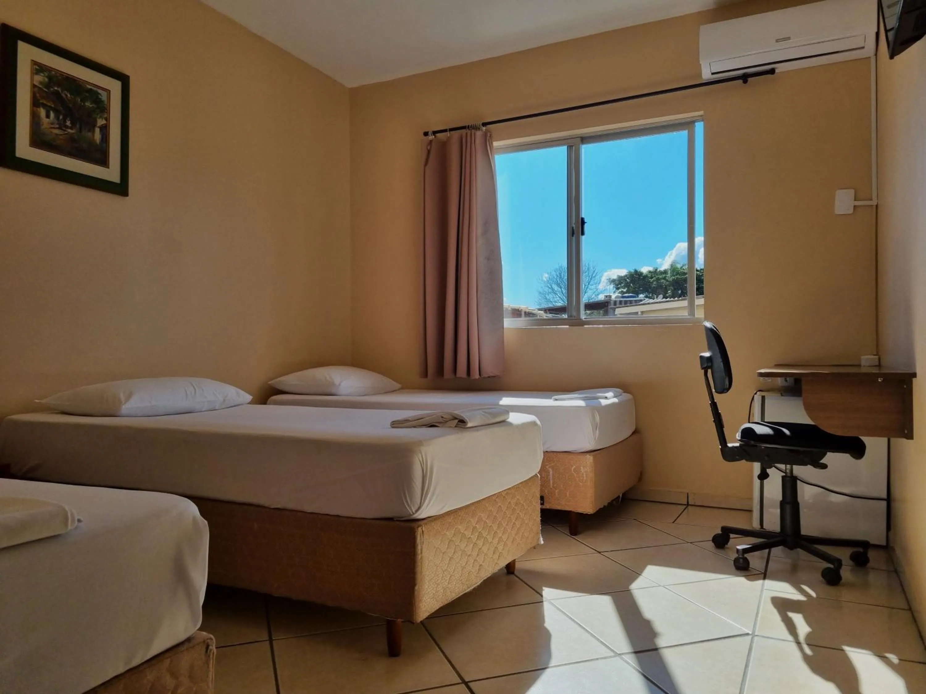 Luxury Triple Room in Hotel Pontal