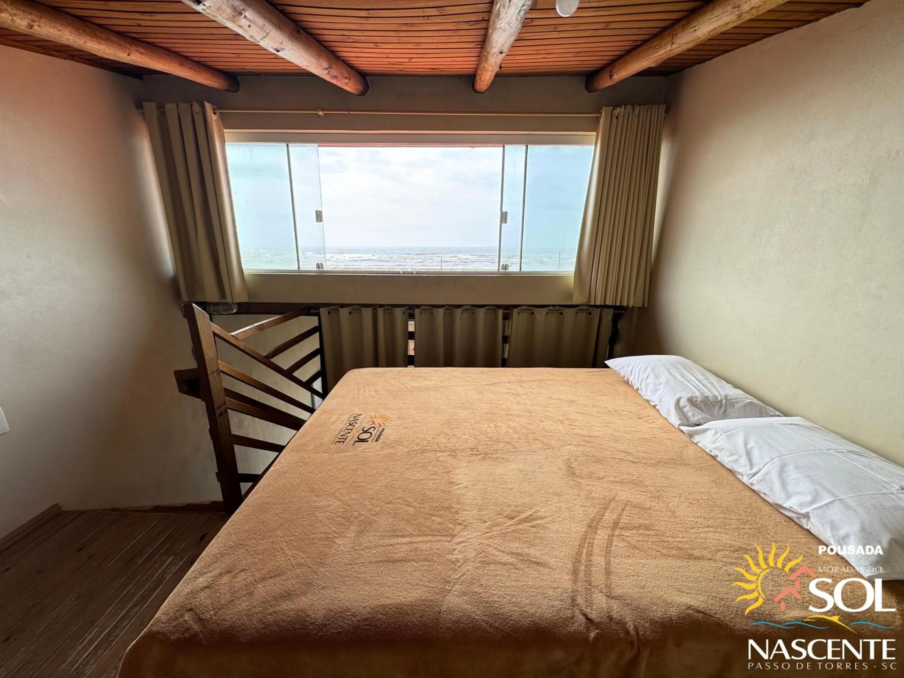 Photo of the whole room, Bed in Pousada Moradas do Sol Nascente