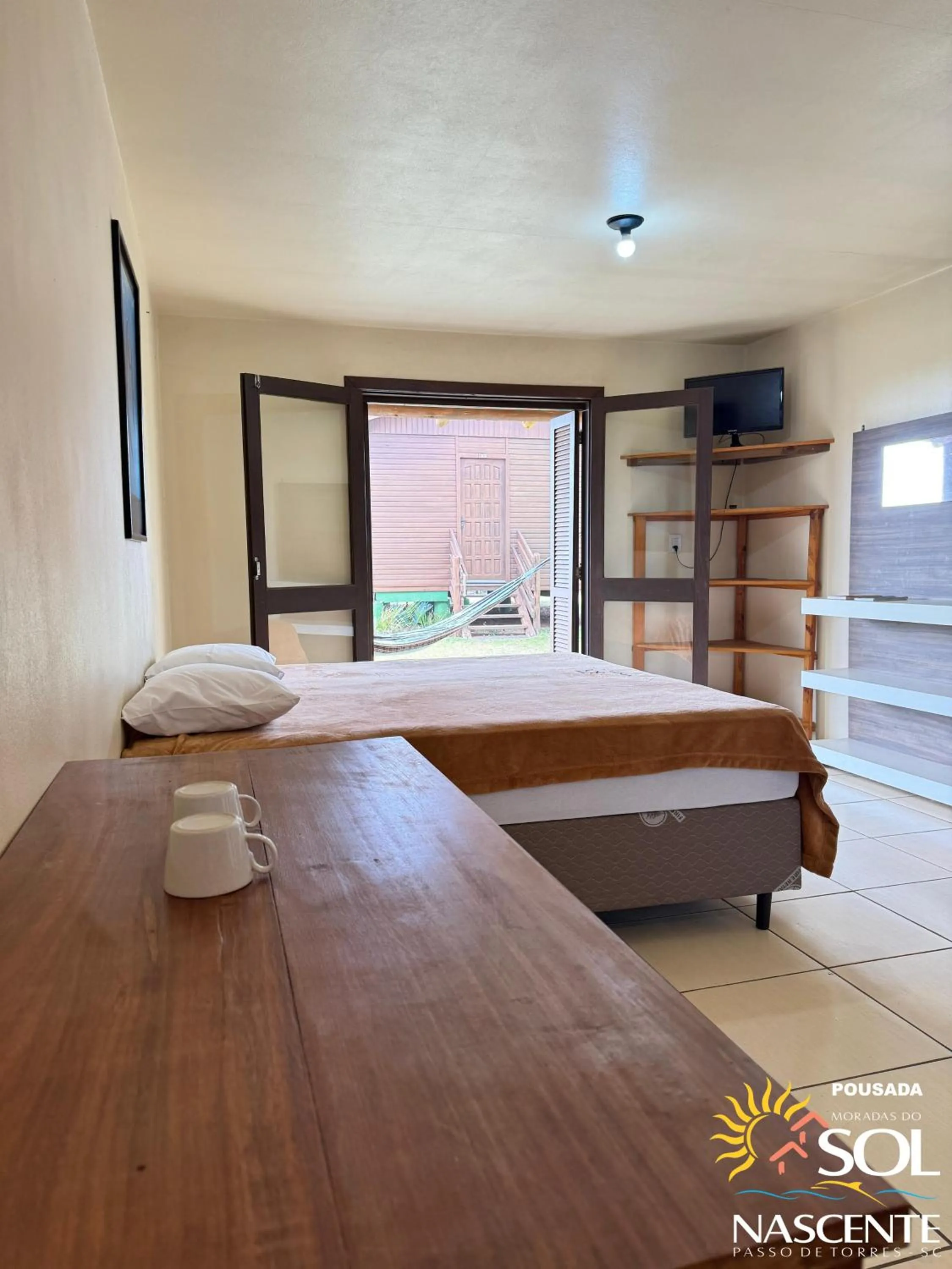 Photo of the whole room, Bed in Pousada Moradas do Sol Nascente