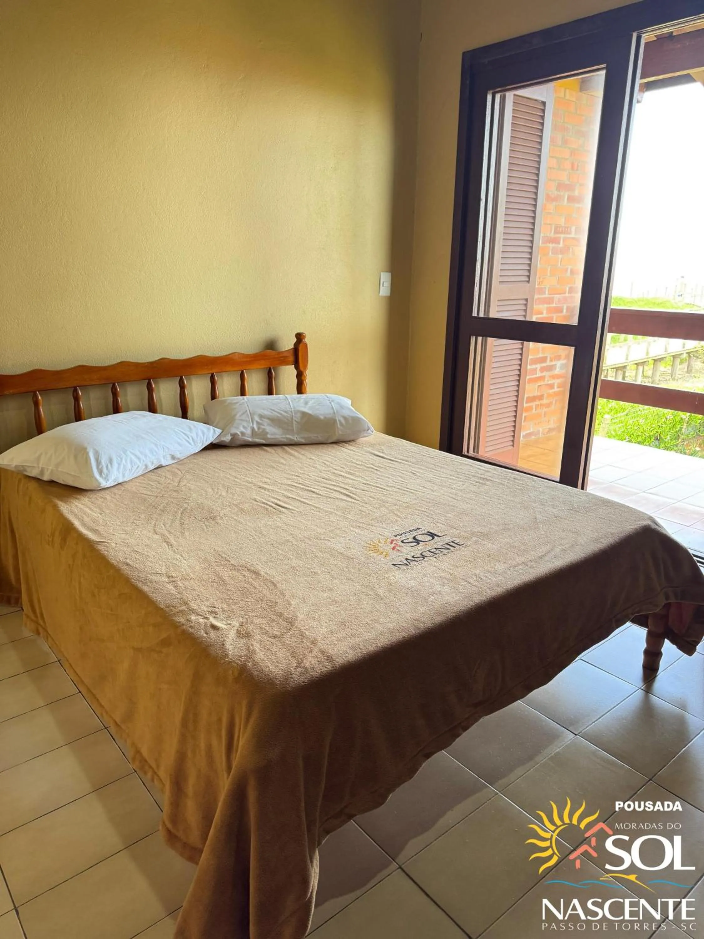 Photo of the whole room, Bed in Pousada Moradas do Sol Nascente