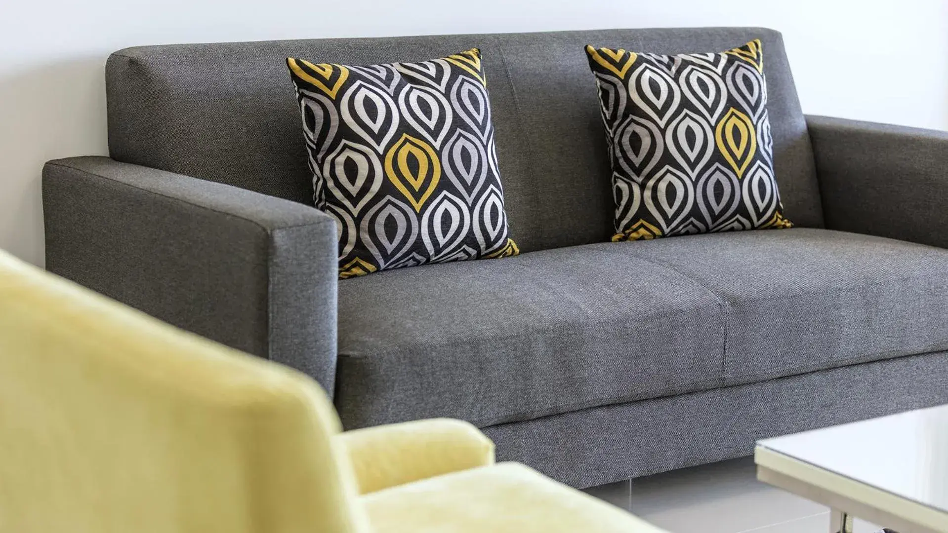 Seating area in Oaks Brisbane Woolloongabba Suites Seating area in Oaks Brisbane Woolloongabba Suites