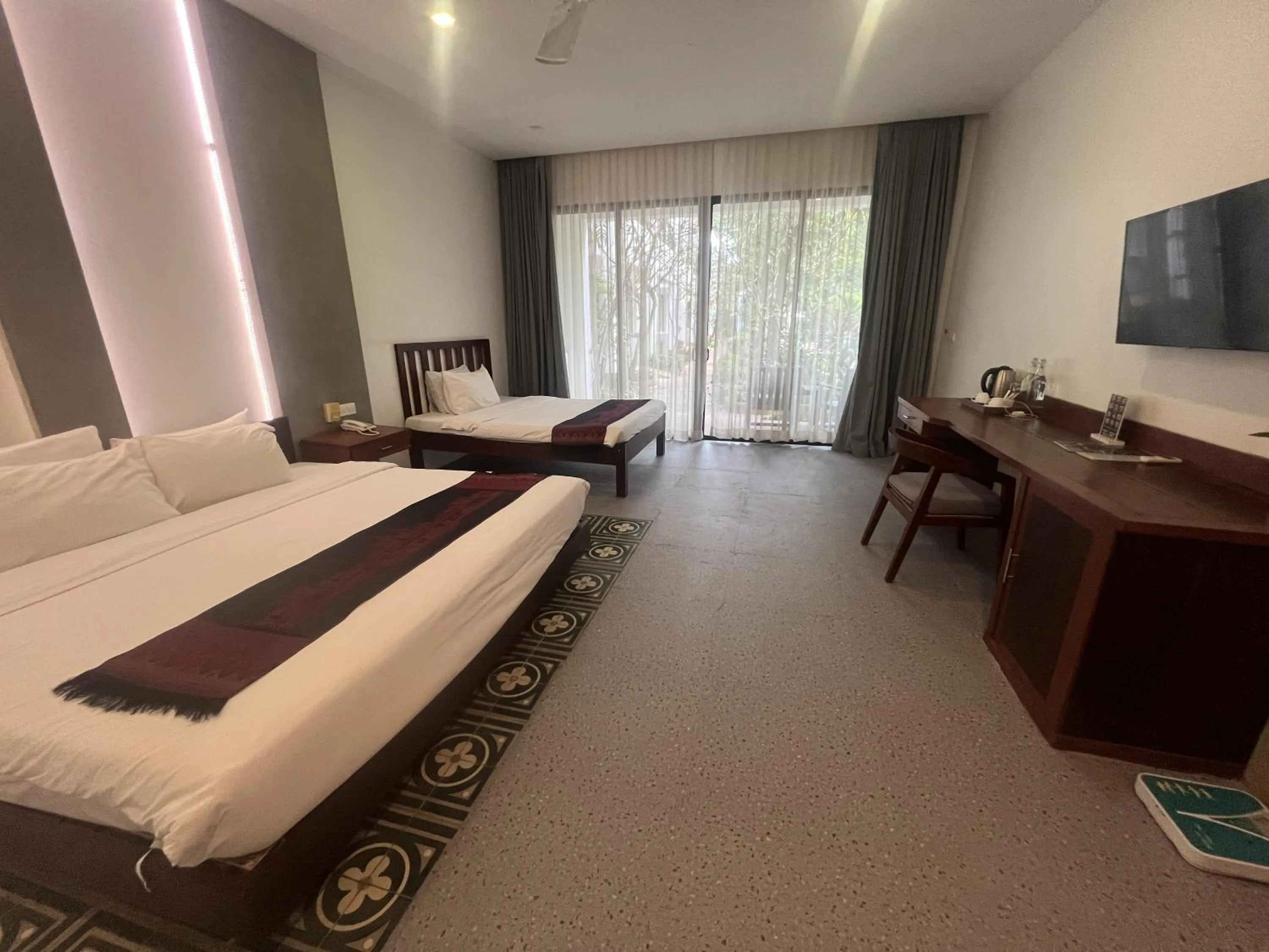 Photo of the whole room, Bed in Tanei Angkor Resort and Spa
