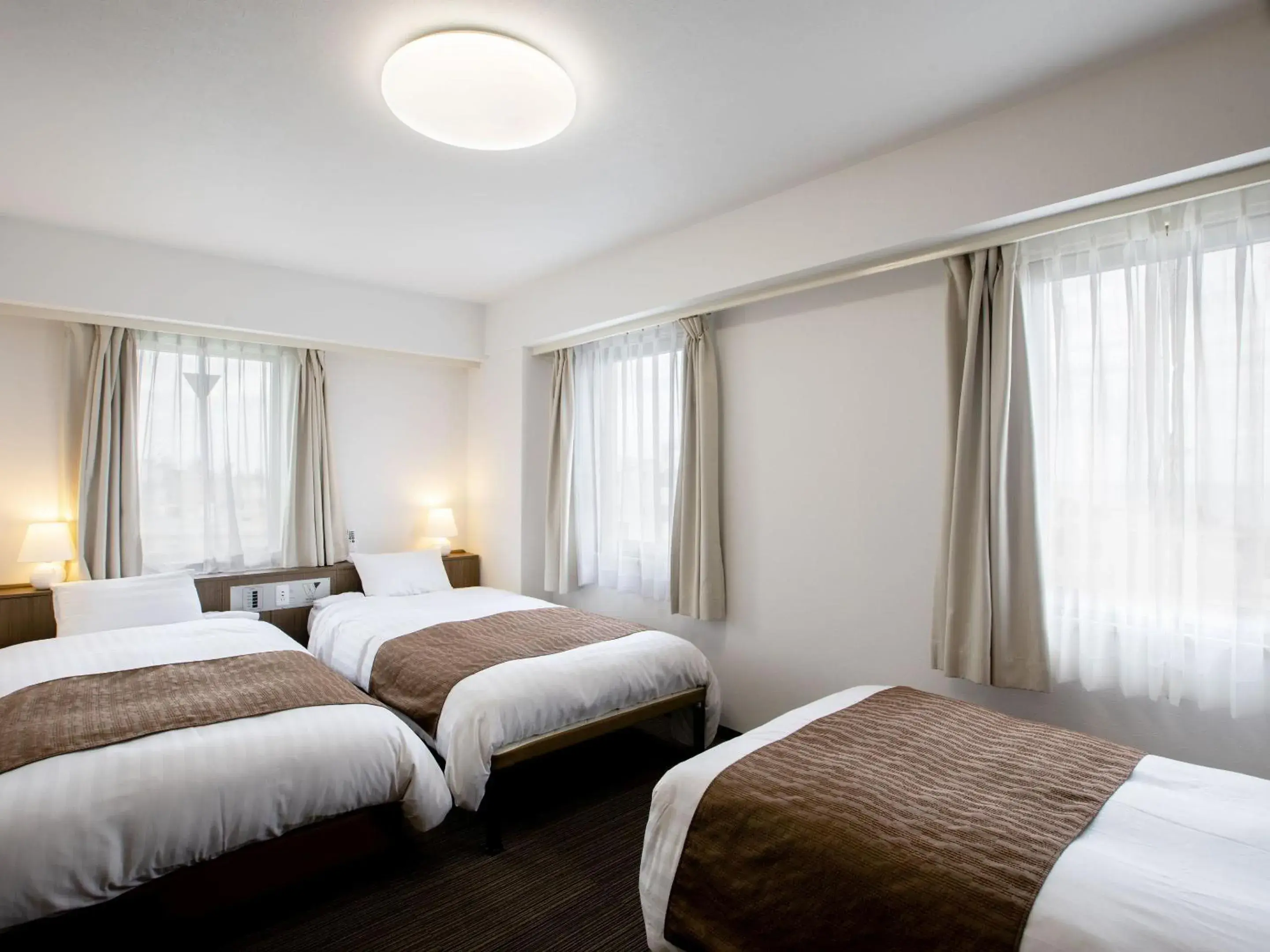 Bed in KOKO STAY Hitachi- formerly Hotel Wing International Hitachi Bed in KOKO STAY Hitachi- formerly Hotel Wing International Hitachi