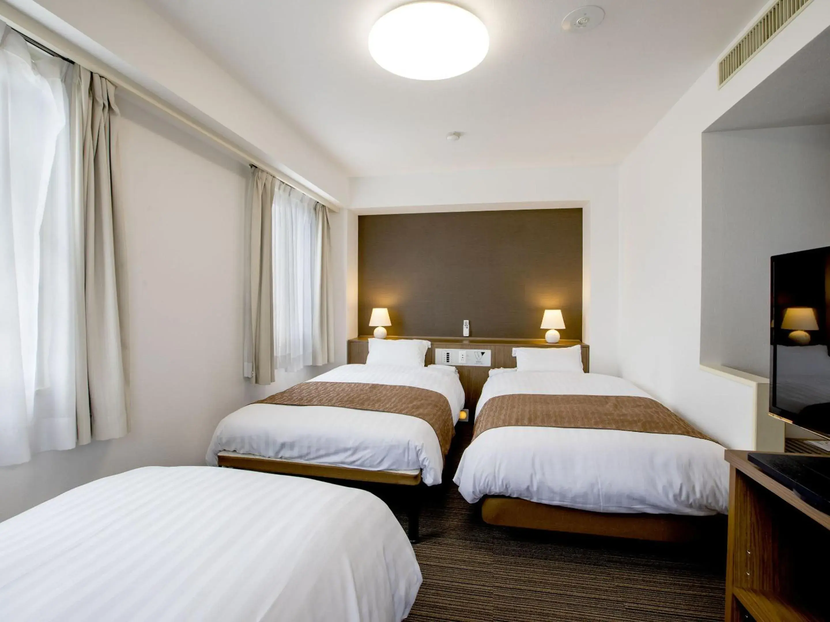 Bed in KOKO STAY Hitachi- formerly Hotel Wing International Hitachi Bed in KOKO STAY Hitachi- formerly Hotel Wing International Hitachi