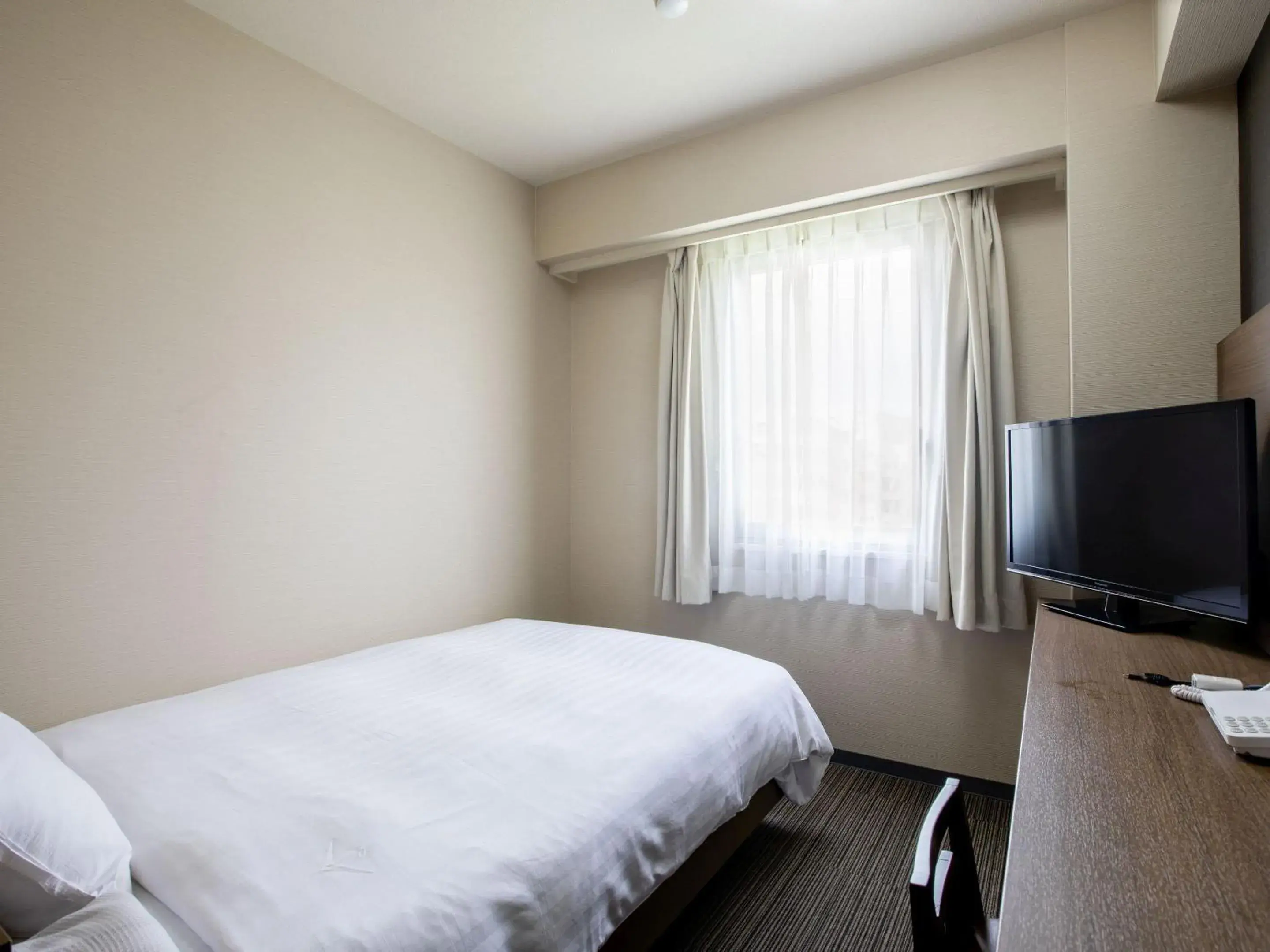 Bed in KOKO STAY Hitachi- formerly Hotel Wing International Hitachi Bed in KOKO STAY Hitachi- formerly Hotel Wing International Hitachi