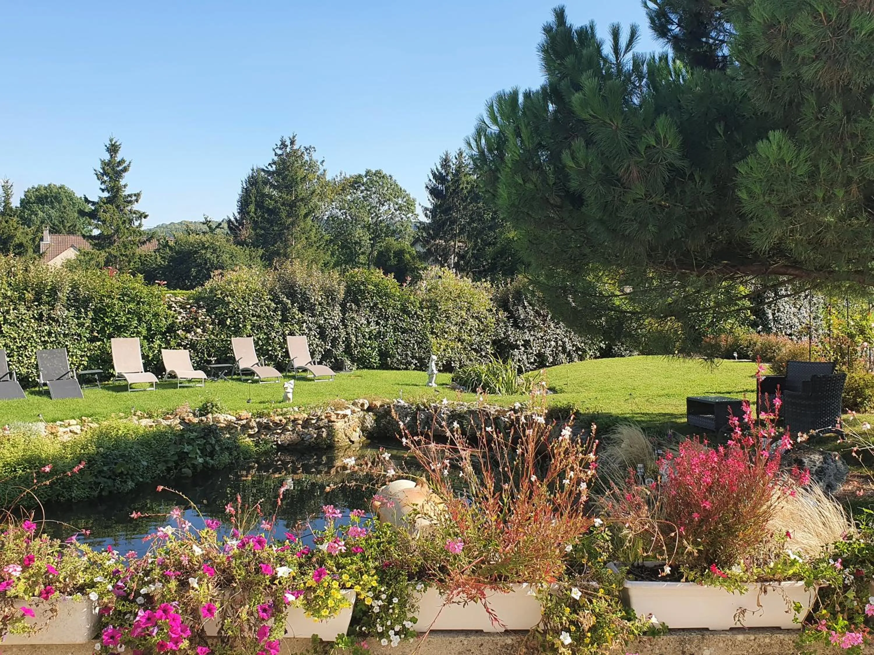 Garden view in Chambre d'Hôte Les Ondines