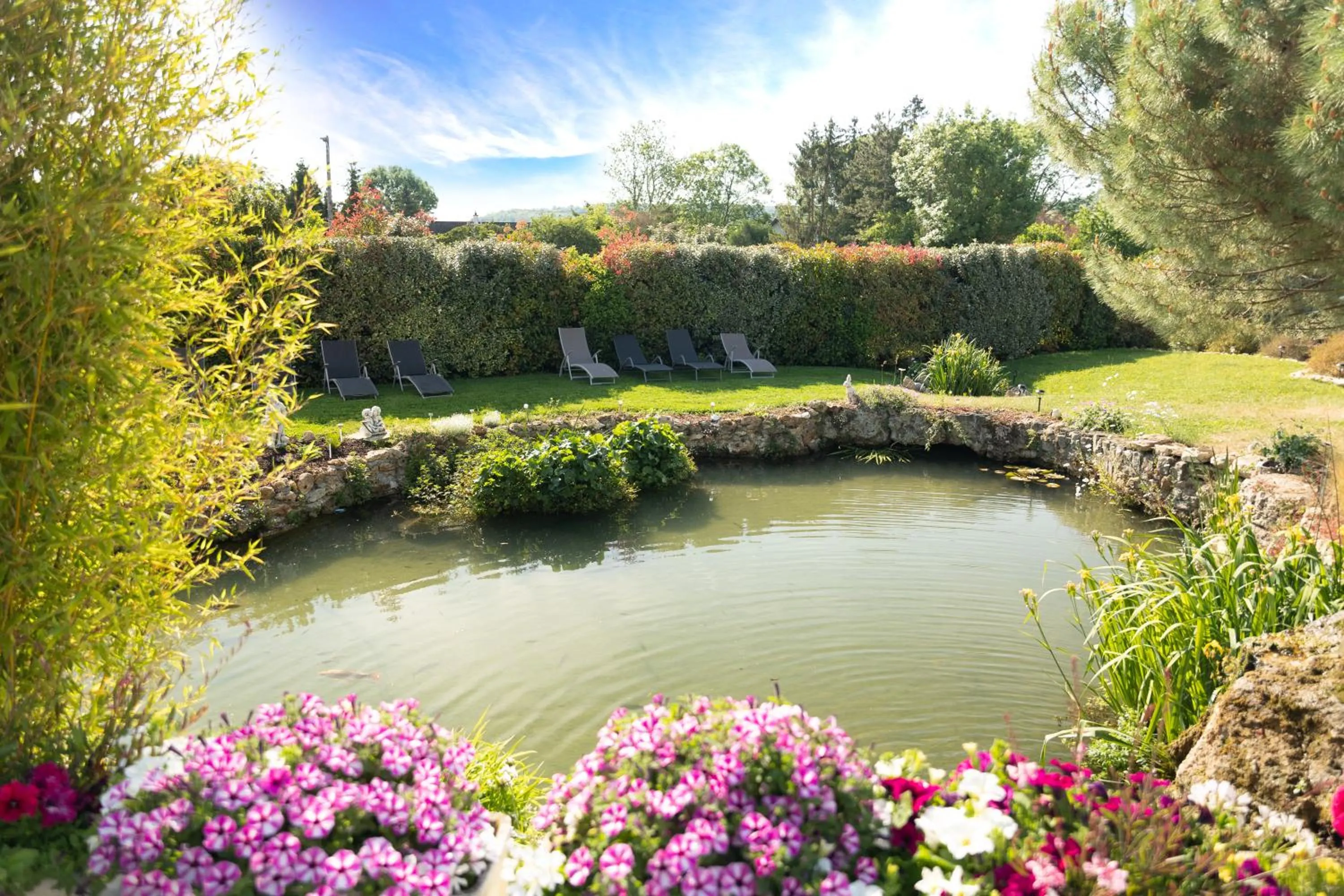 Garden in Chambre d'Hôte Les Ondines