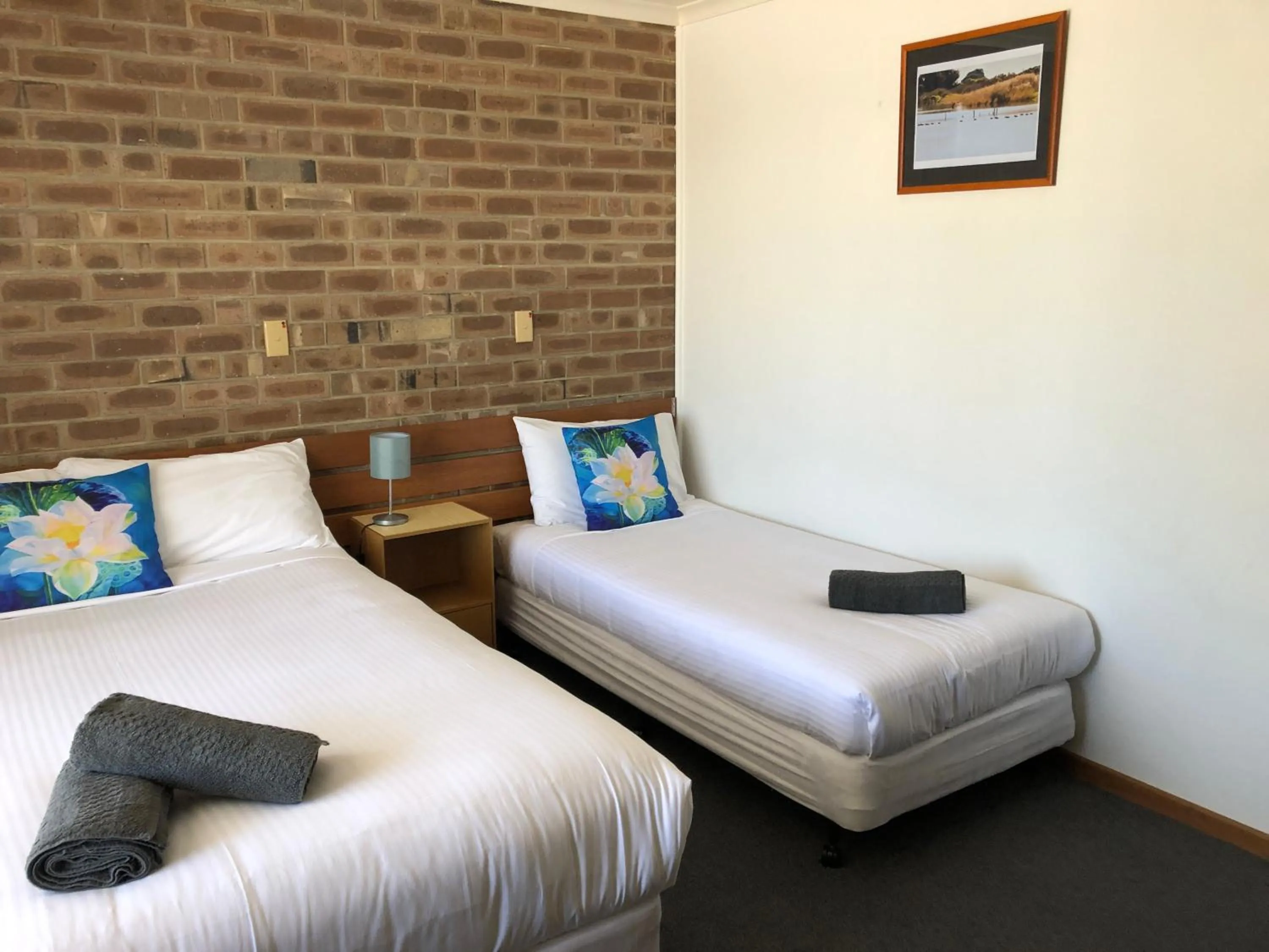 Bed in Lake Albert Motel