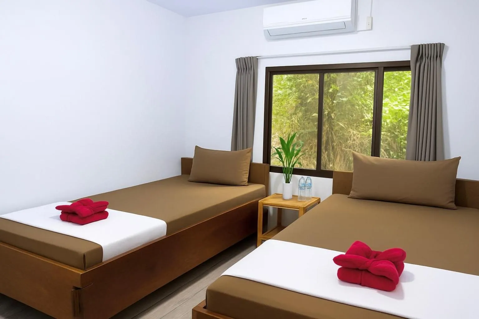 Bed in Happy Elephant Bungalows