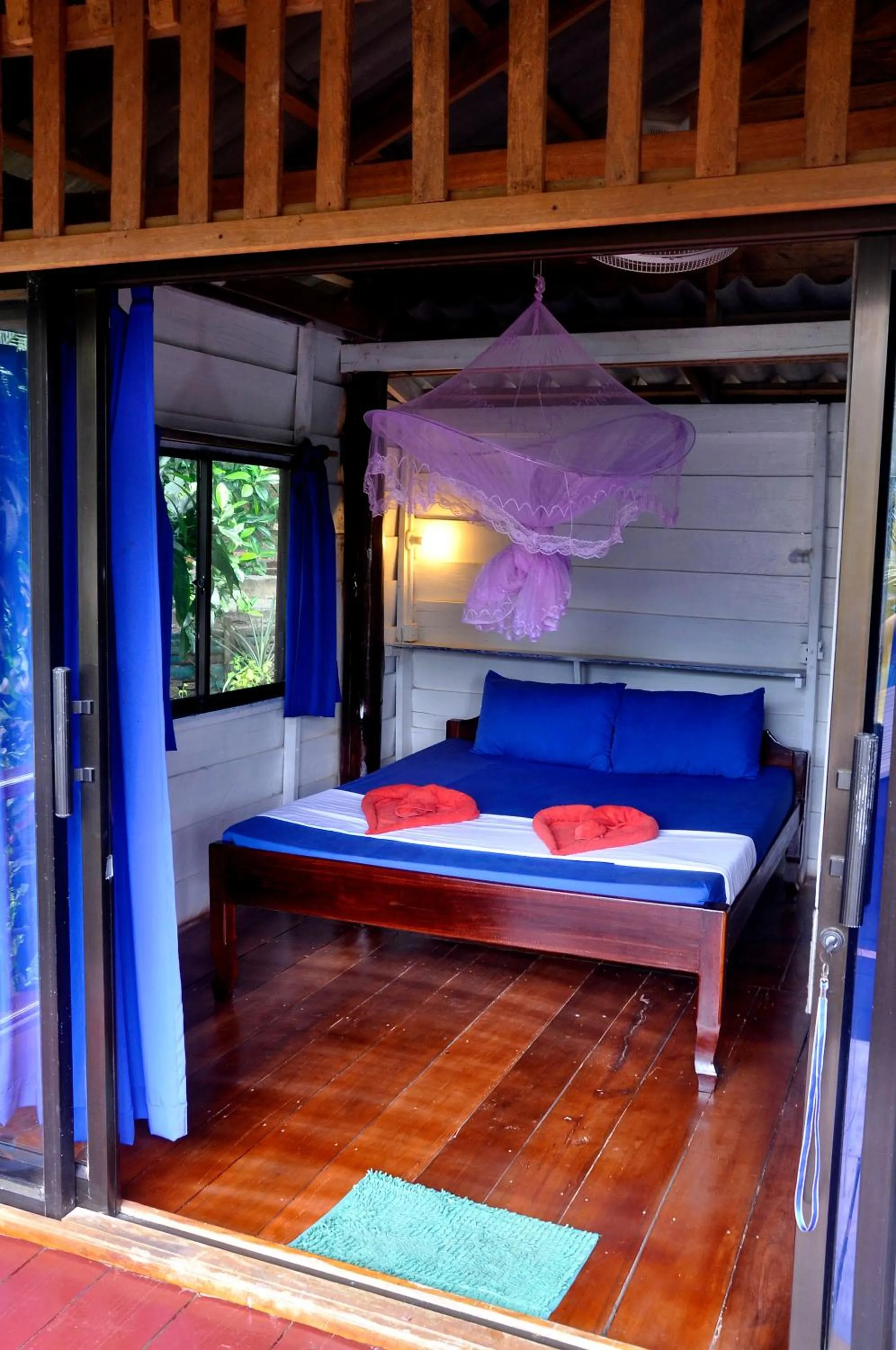 Bed in Happy Elephant Bungalows