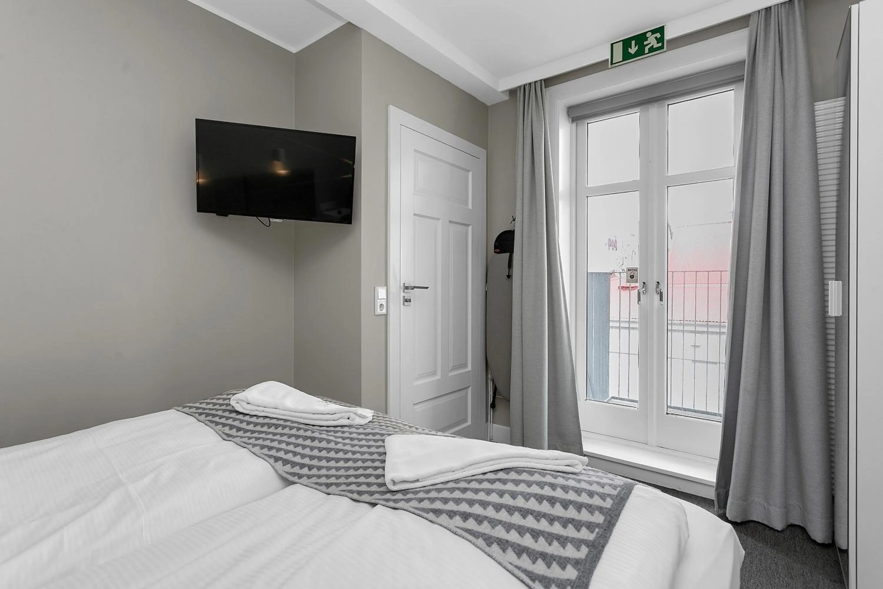 Bed in Ice Apartments Reykjavik by Heimaleiga