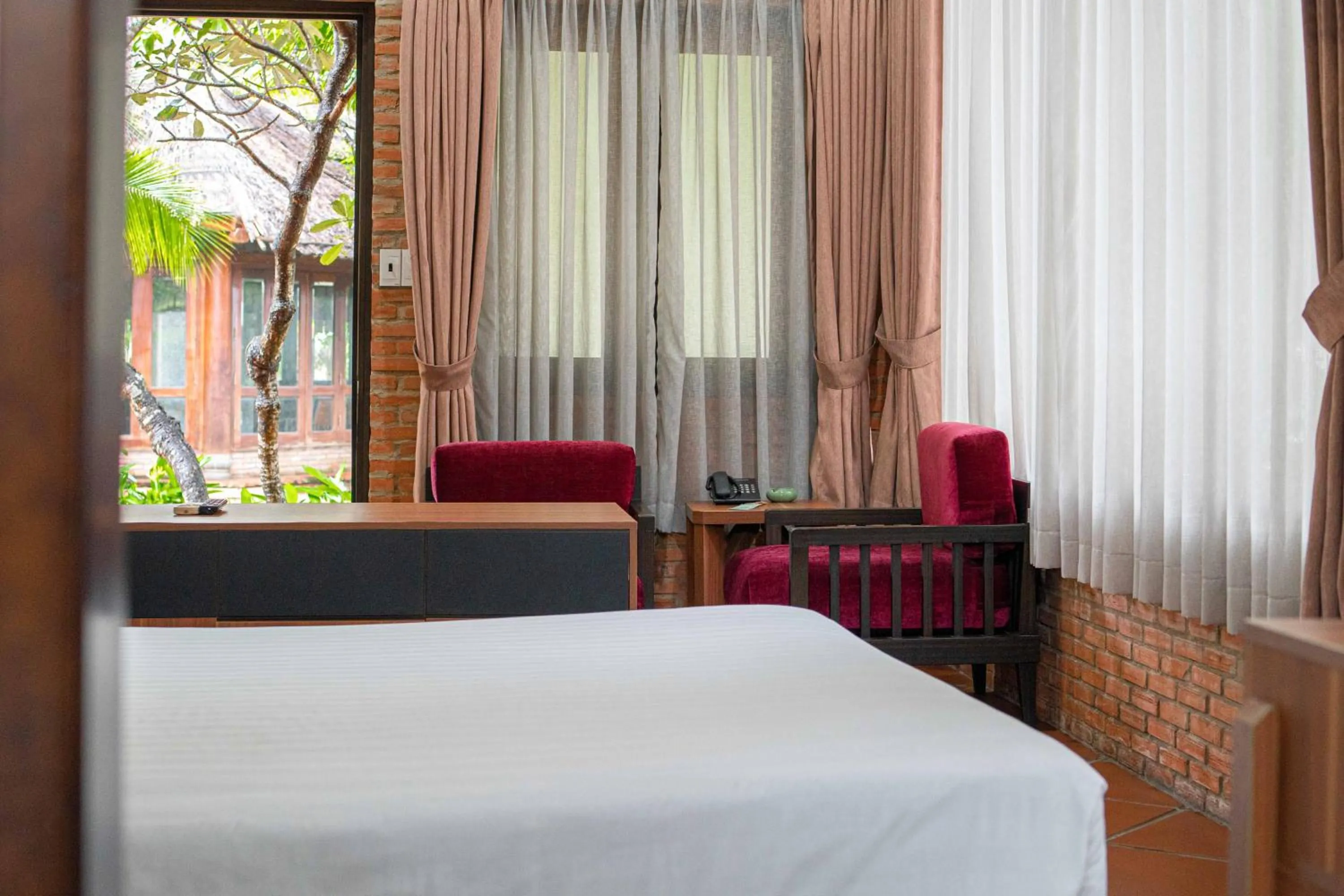 Bed in Mekong Long Thanh Resort & Reststop