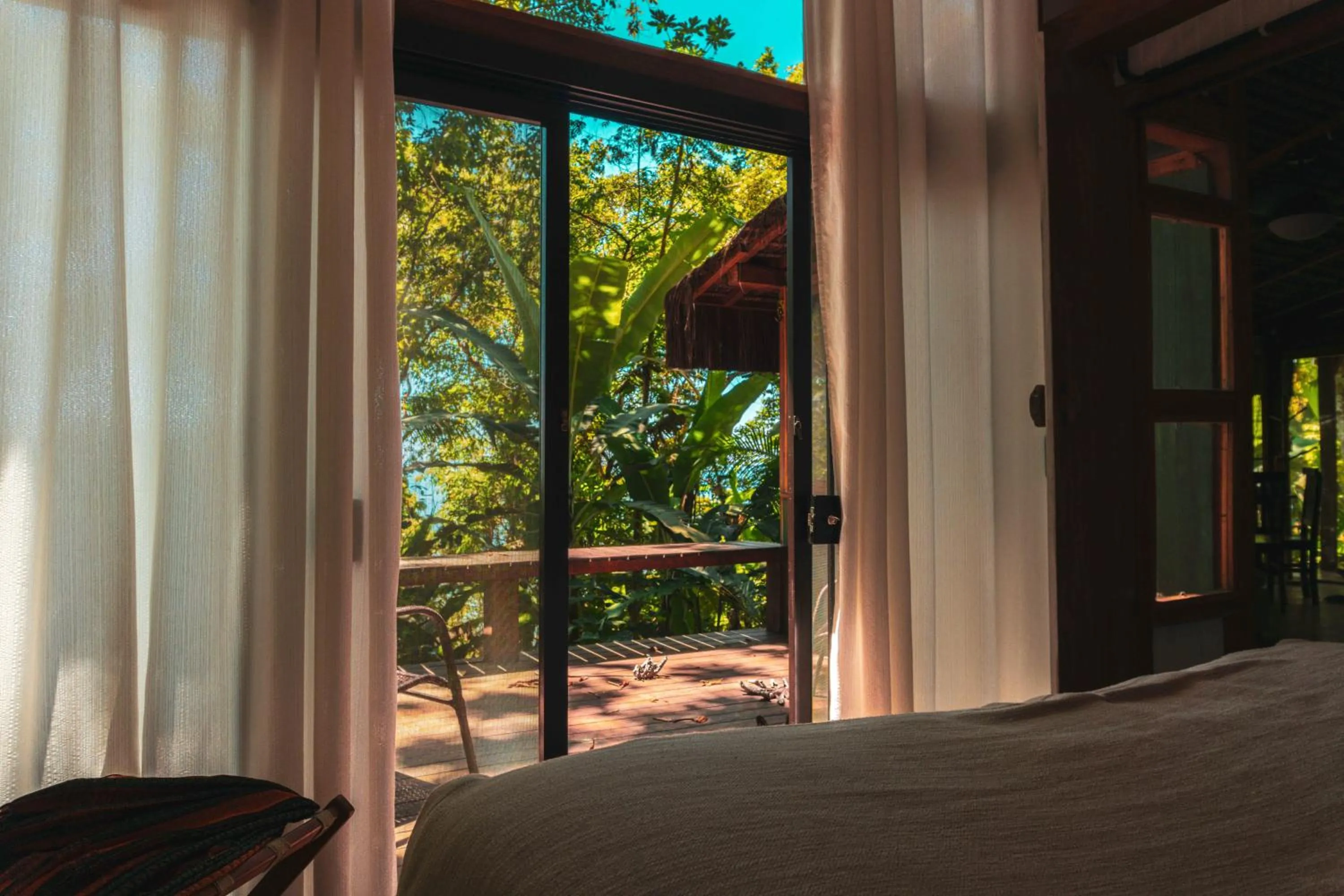 View (from property/room), Bed in Casa Luz Paraty