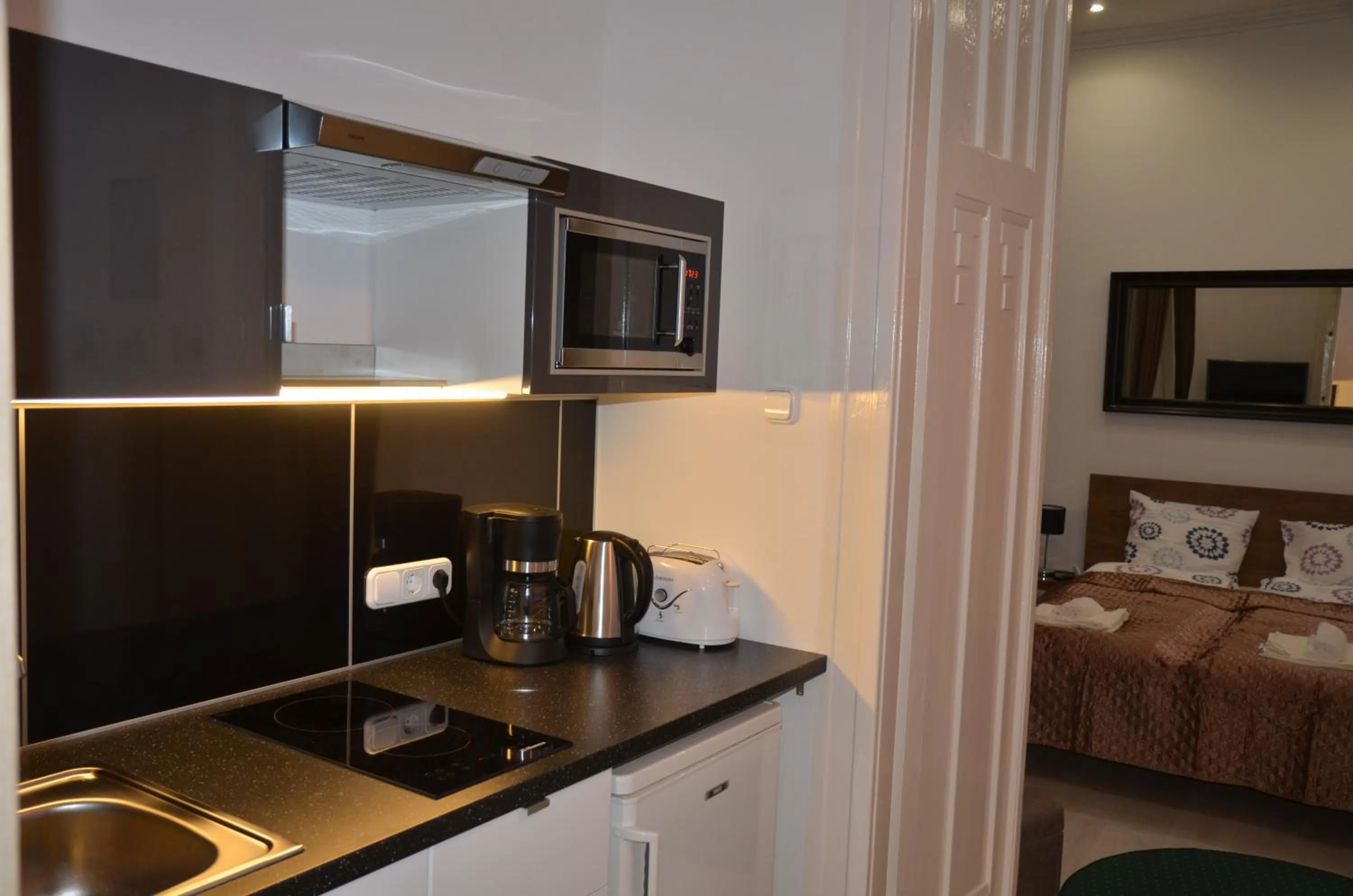 Kitchen or kitchenette, Bed in Váci Street Downtown Apartments