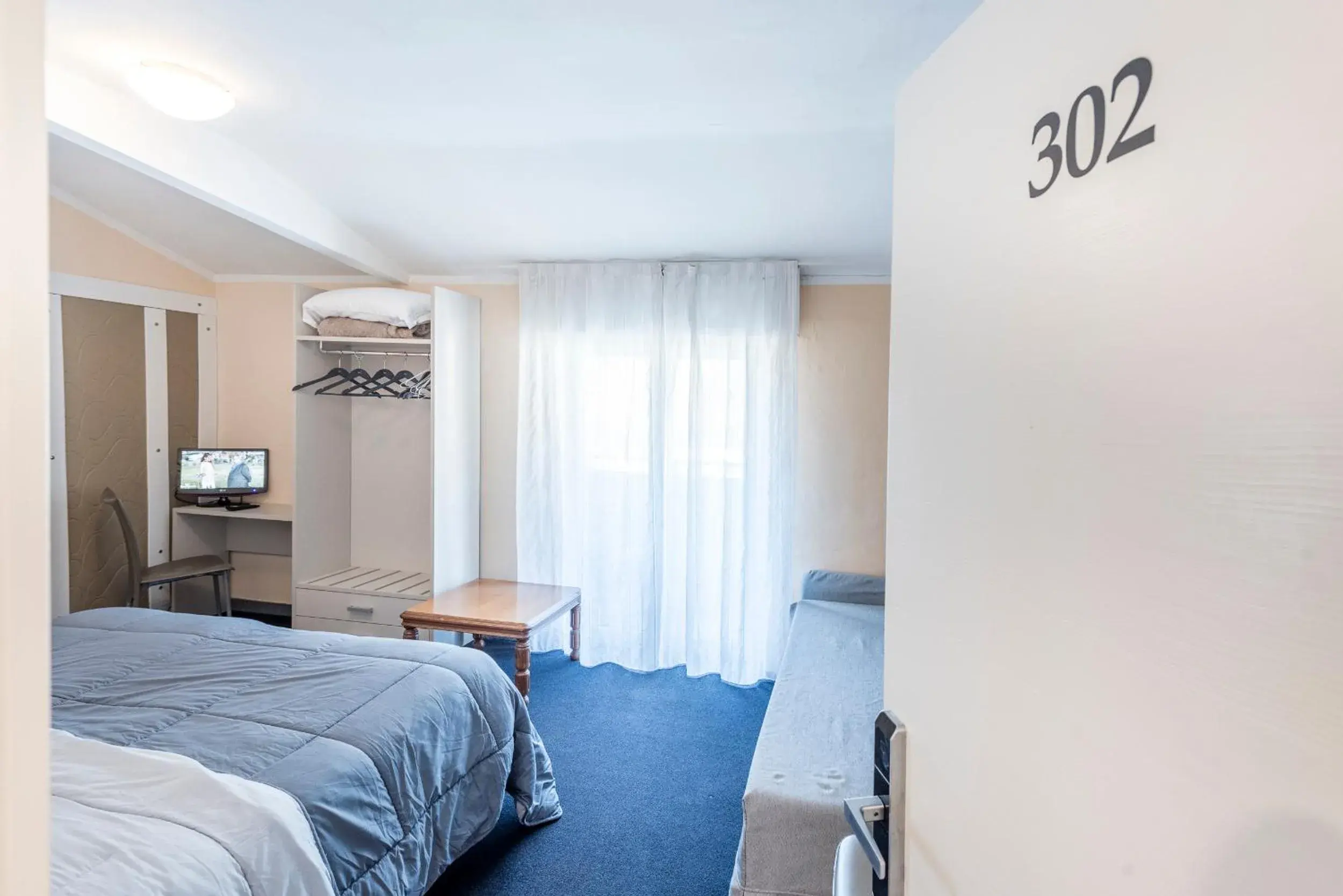 Bed in Hotel Rubino Bed in Hotel Rubino