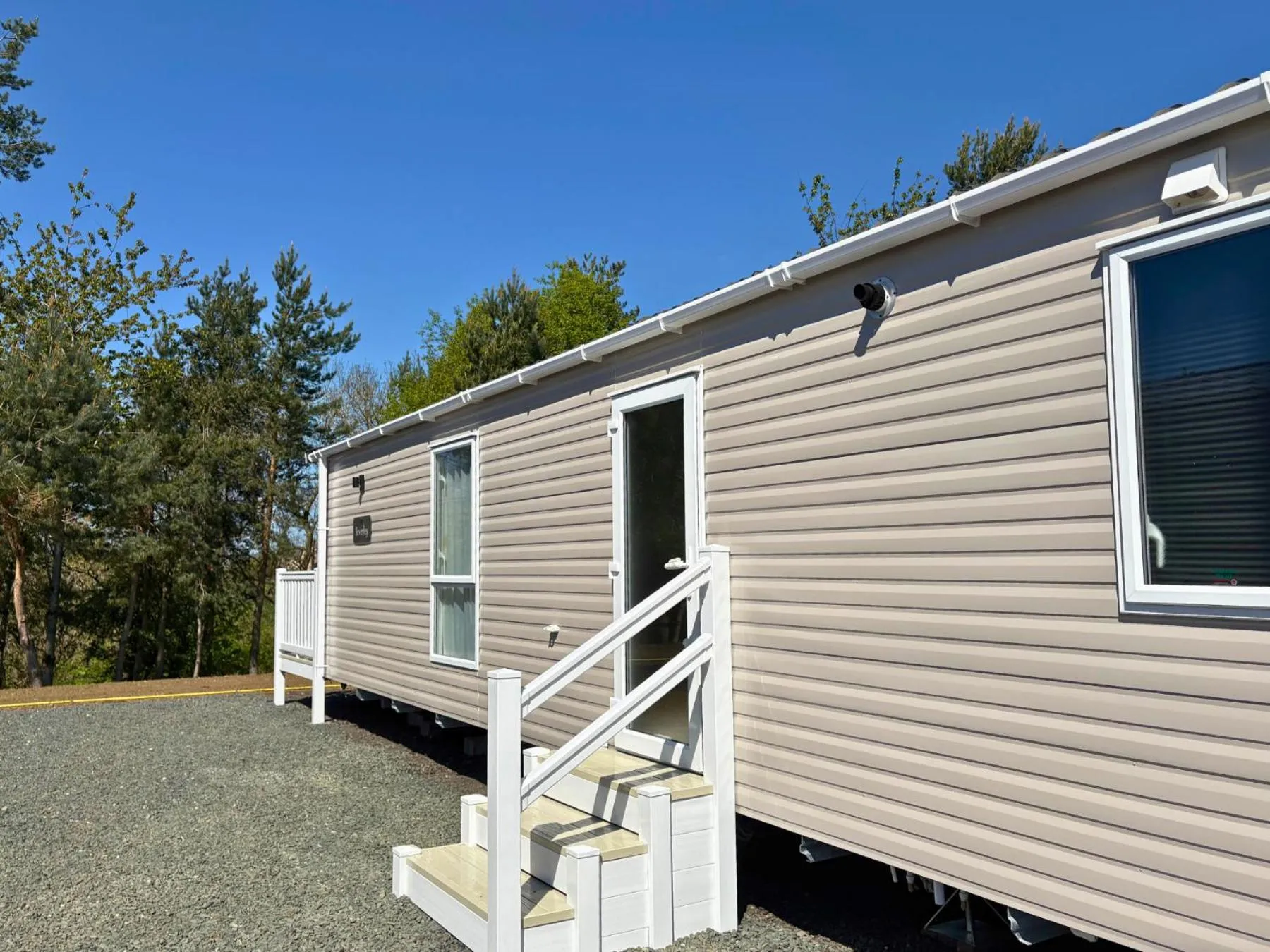 Property building in Linwater Caravan Park - Luxury Lodges and Static Caravans near Edinburgh