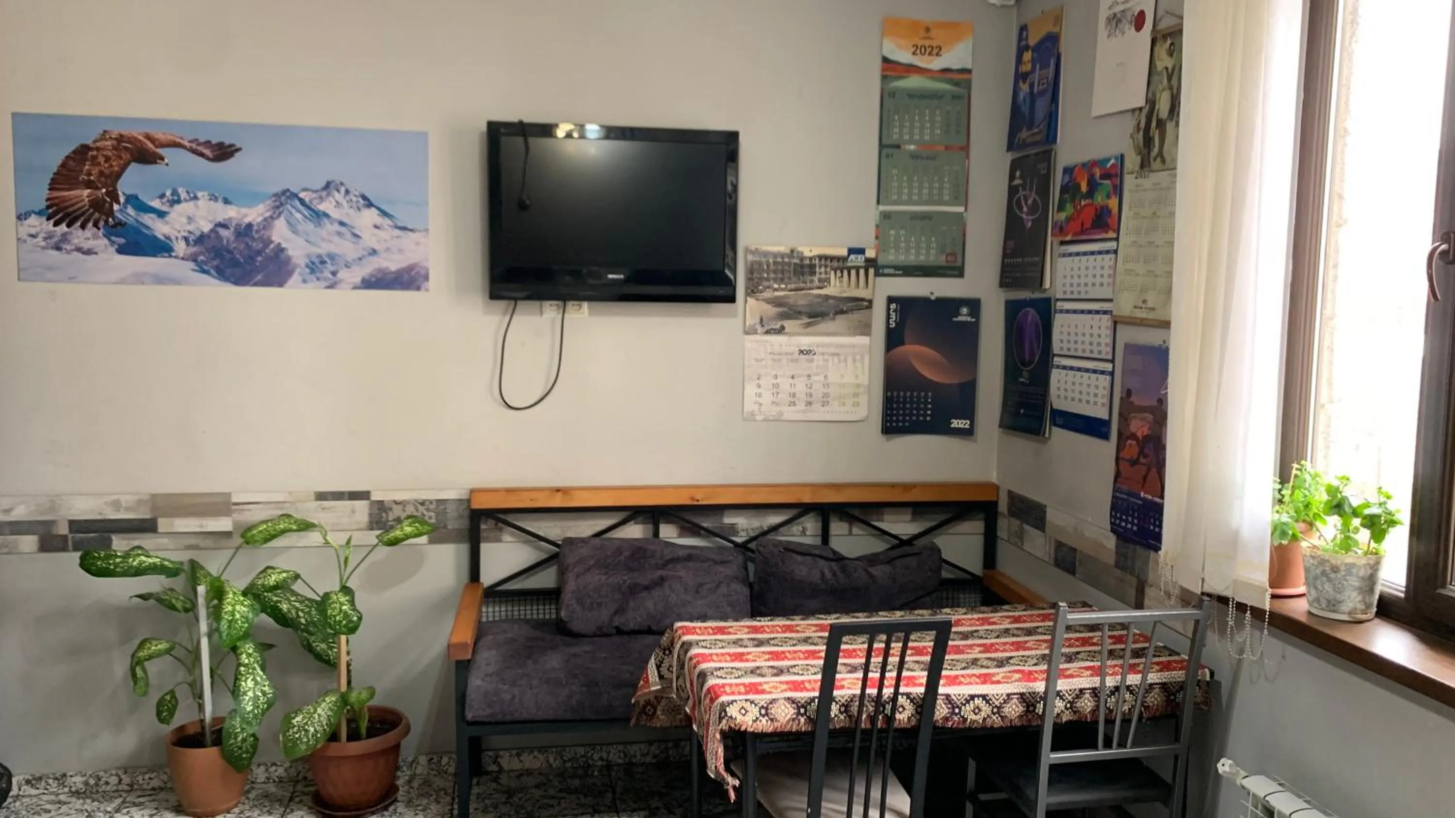 Communal lounge/ TV room in Arm Hostel