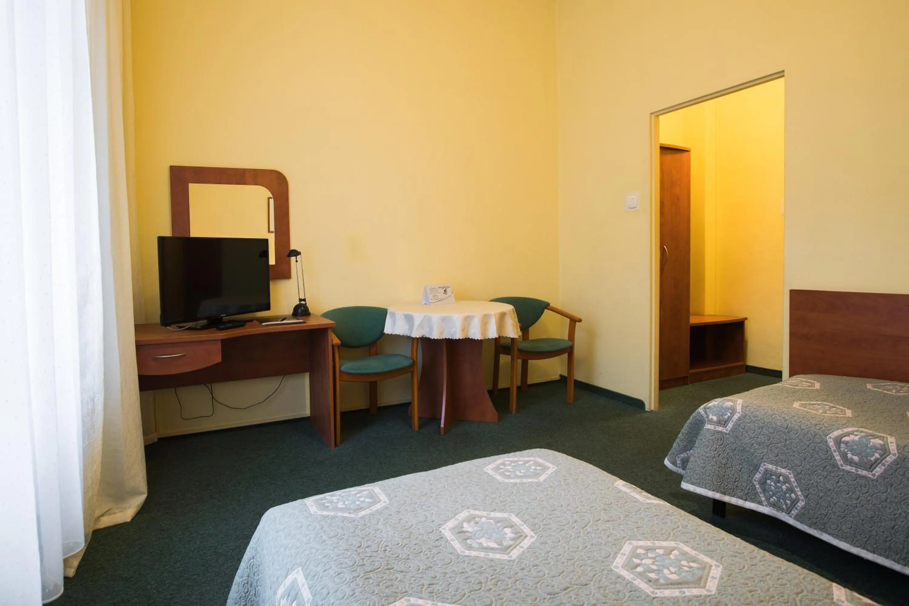 TV and multimedia, Bed in Hotel Kapitan