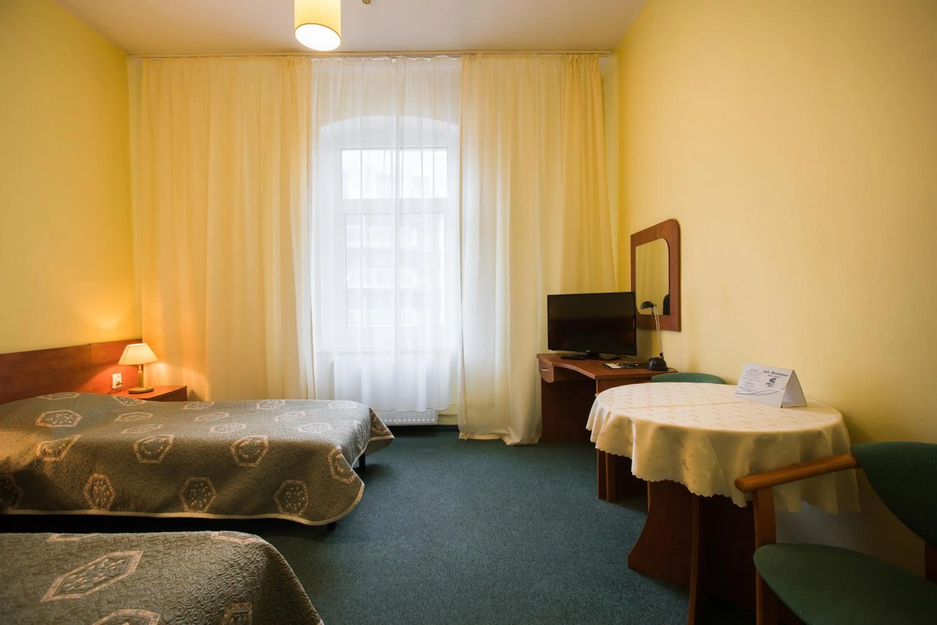 Photo of the whole room, Bed in Hotel Kapitan