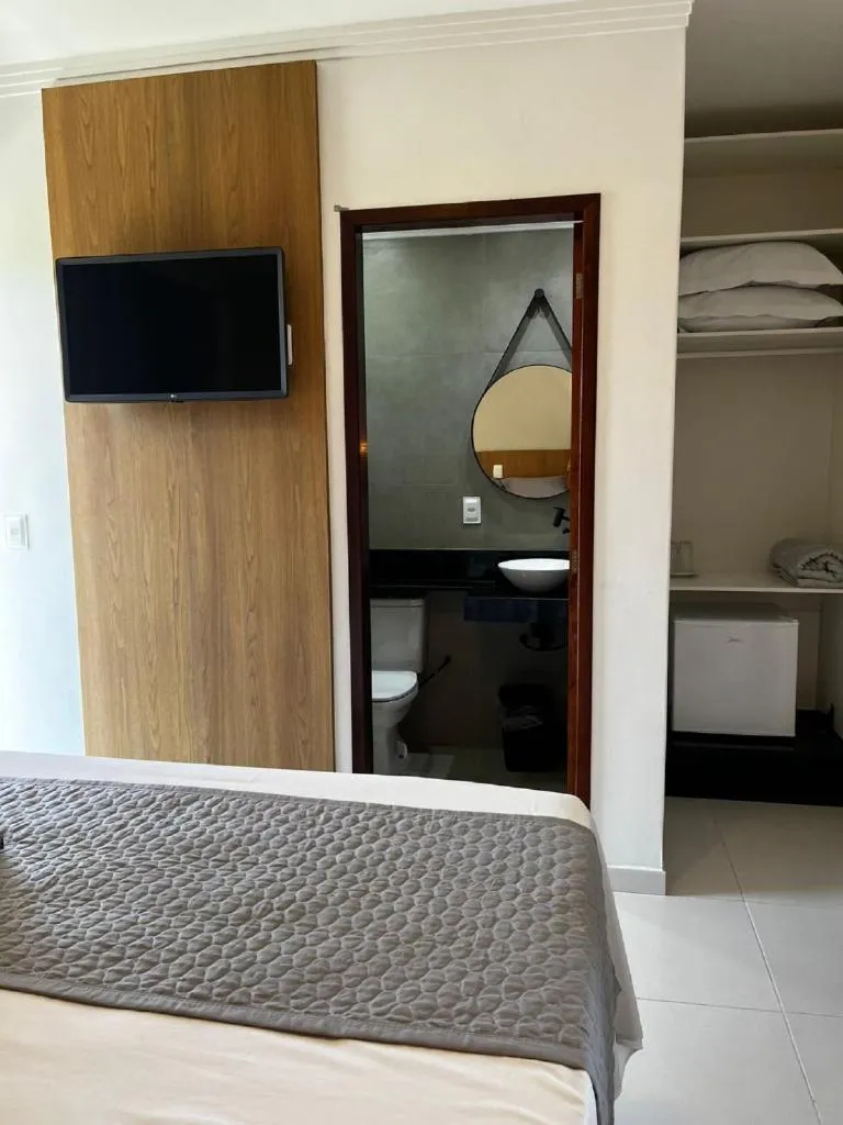 Bed in Pousada Concha Dourada