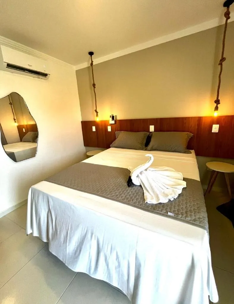 Bed in Pousada Concha Dourada