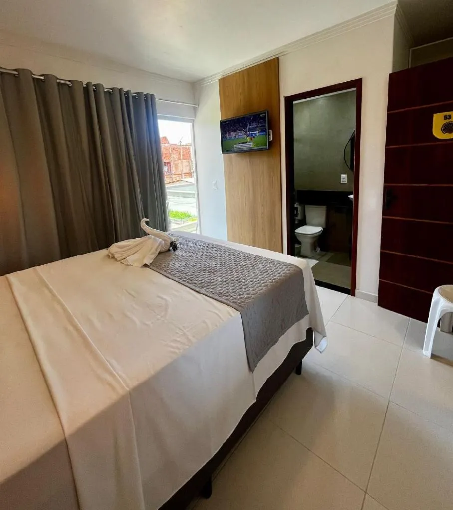 Bed in Pousada Concha Dourada