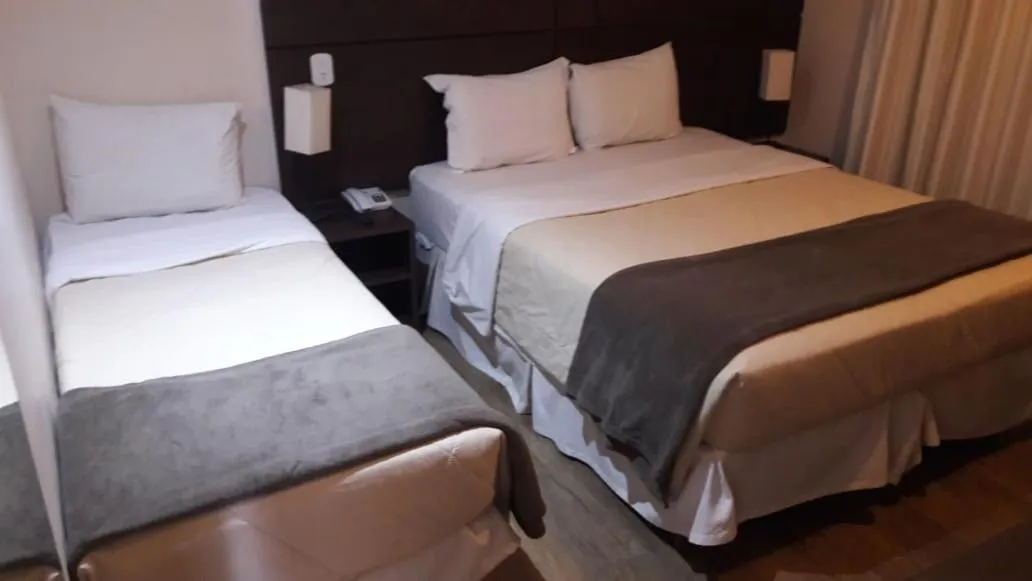 Bed in Hotel Maruá