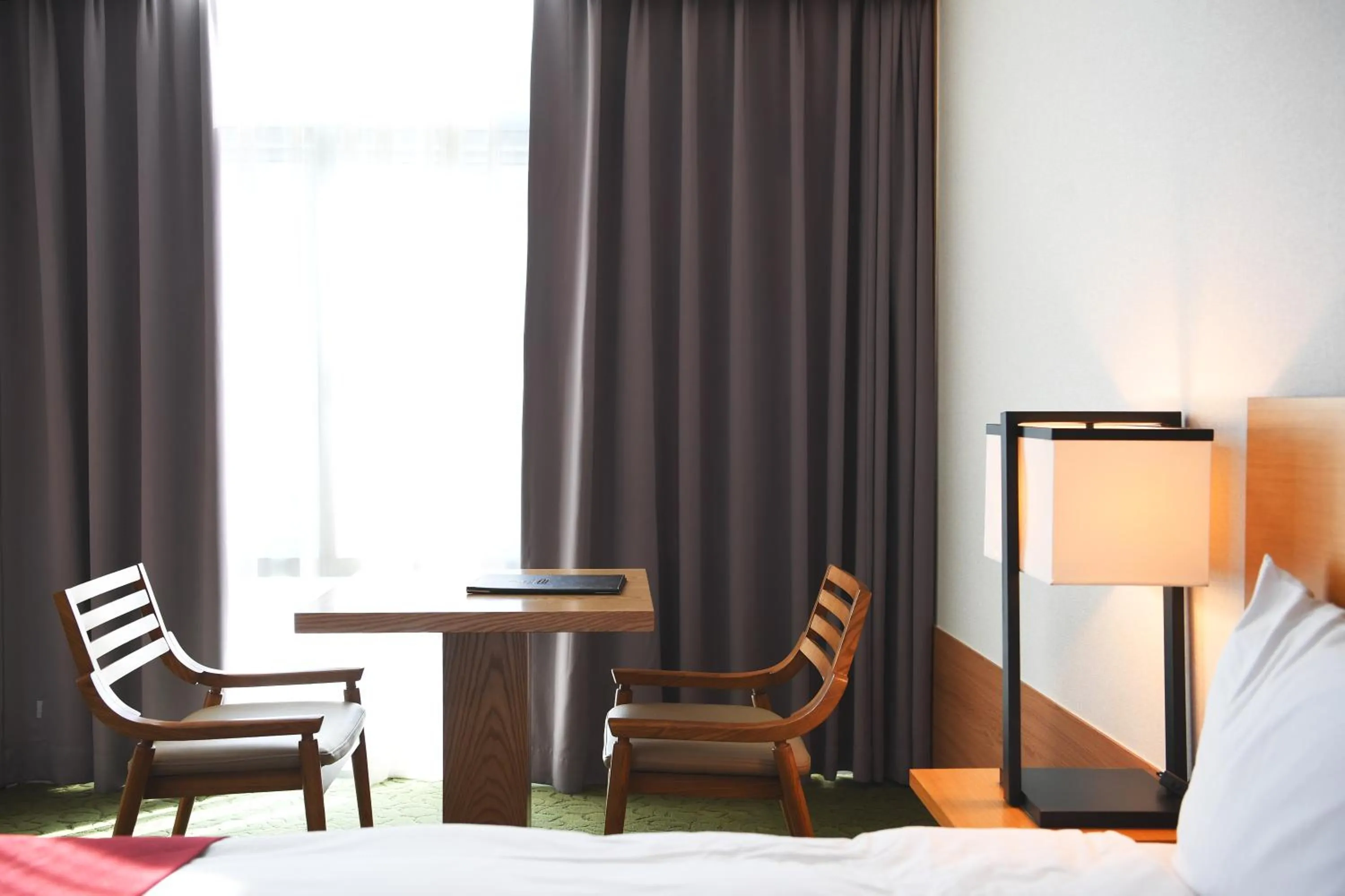 Seating area, Bed in Hotel Laonzena