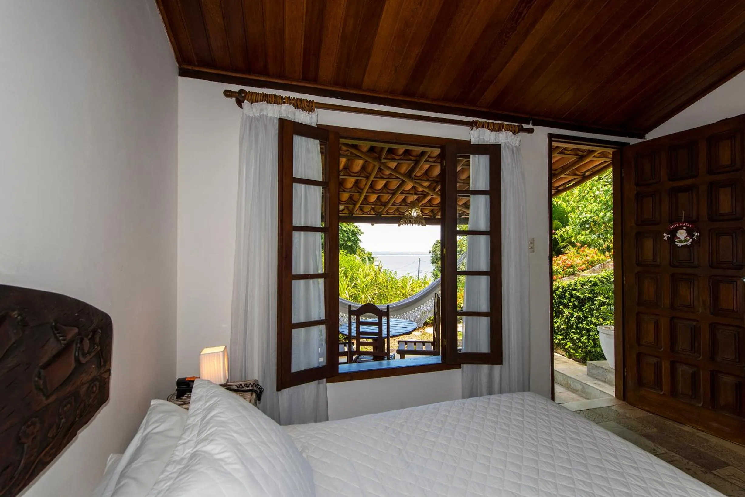 Balcony/Terrace, Bed in Pousada Natureza