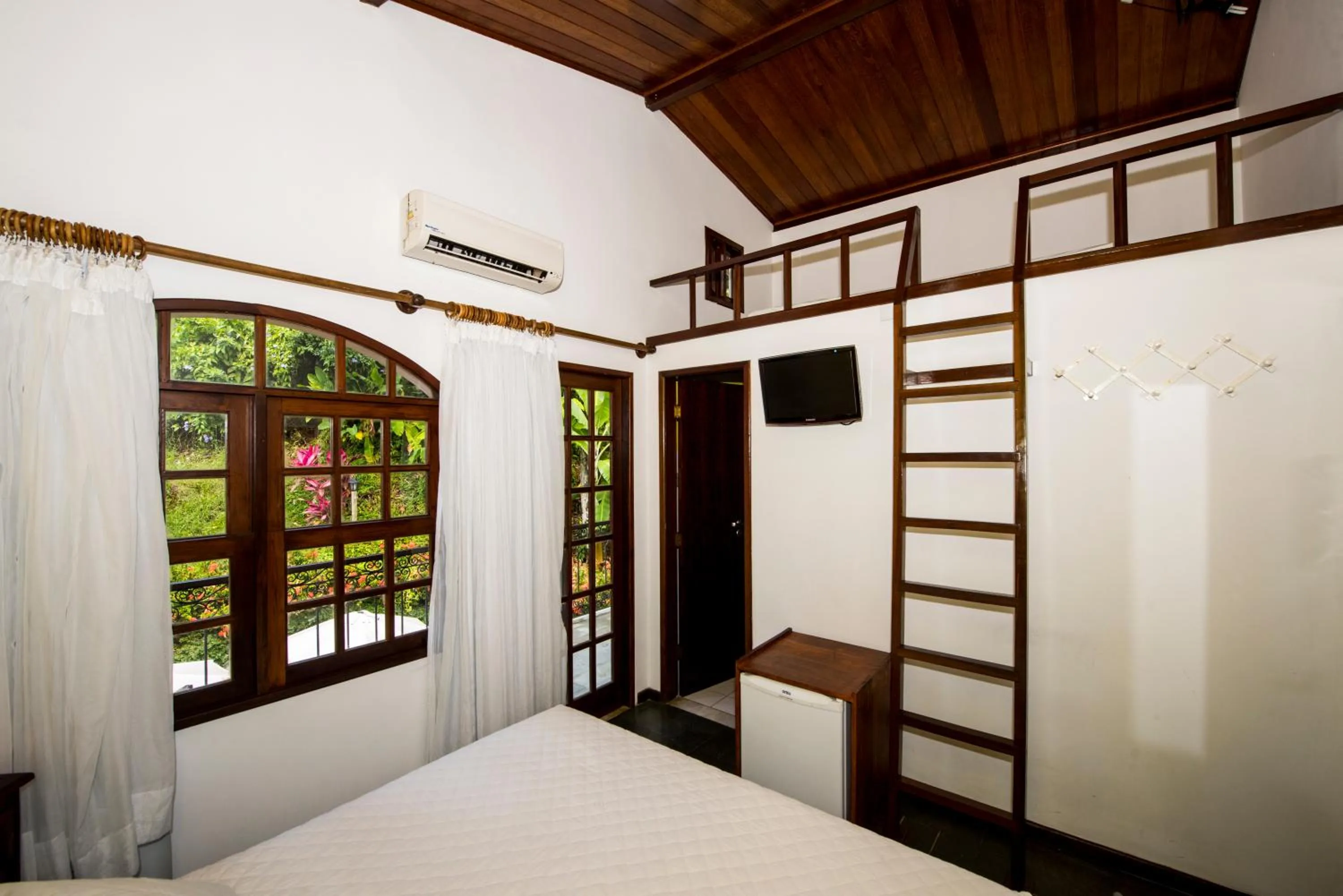 Bed in Pousada Natureza