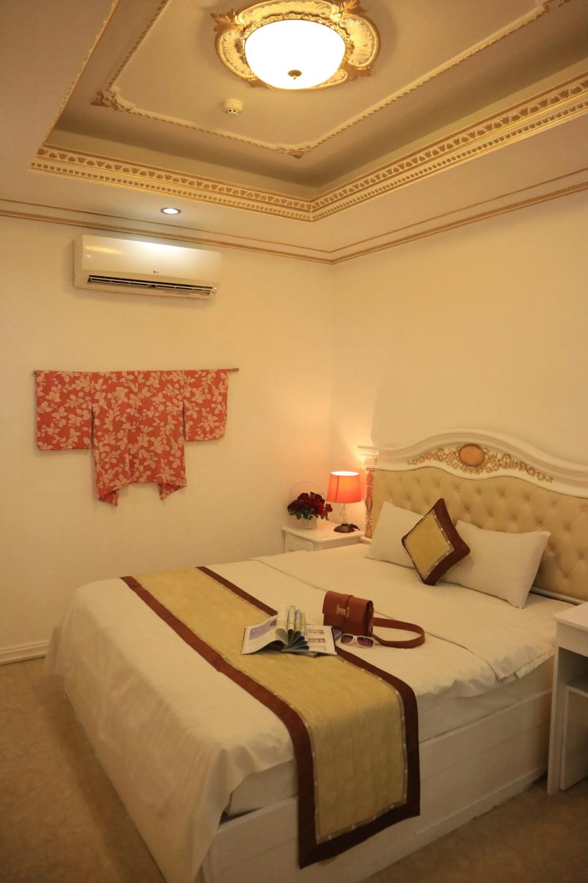 Bedroom in Happy Land Hotel