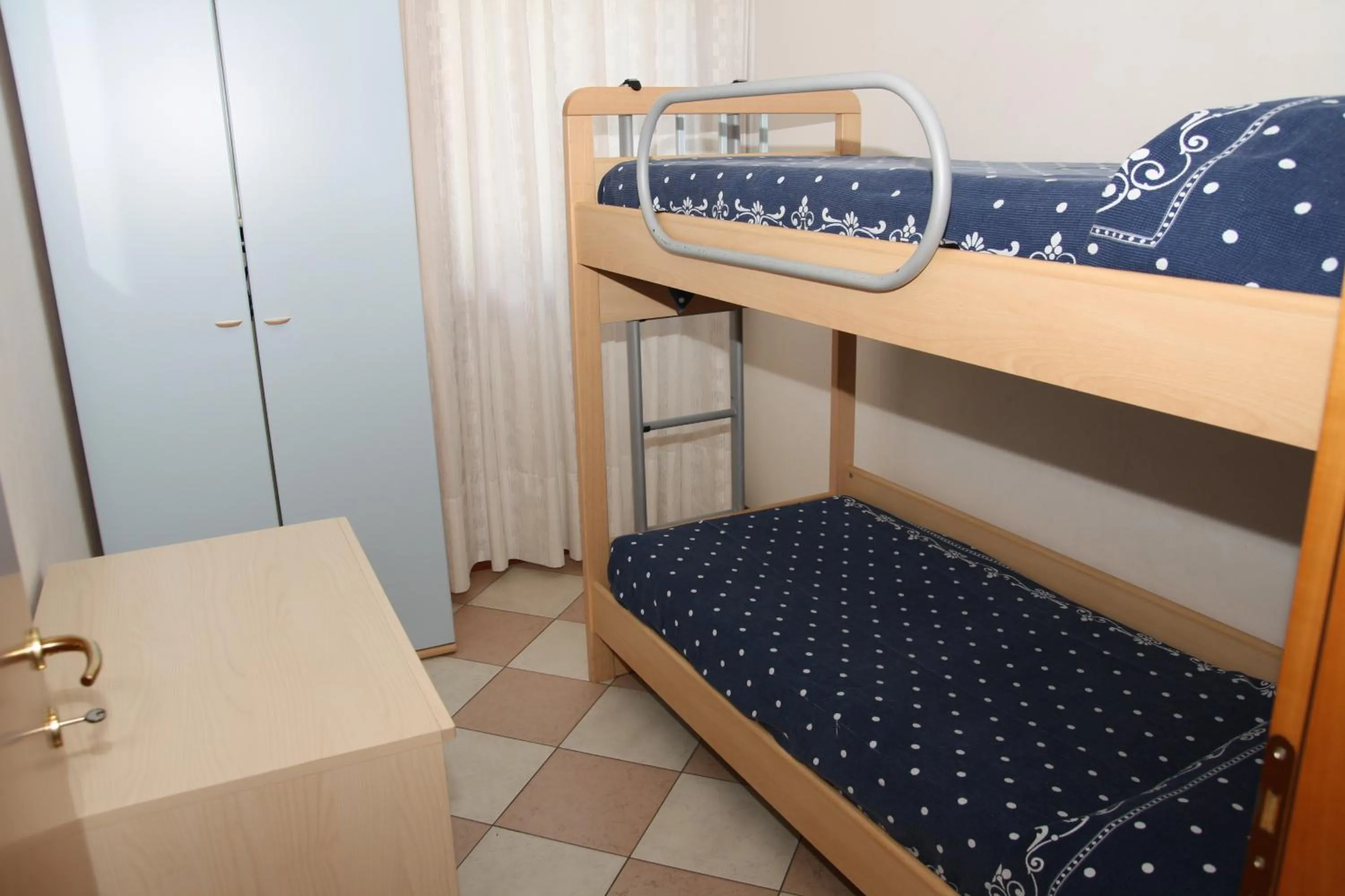 Bedroom, Bed in Family Apartments Residence Trieste