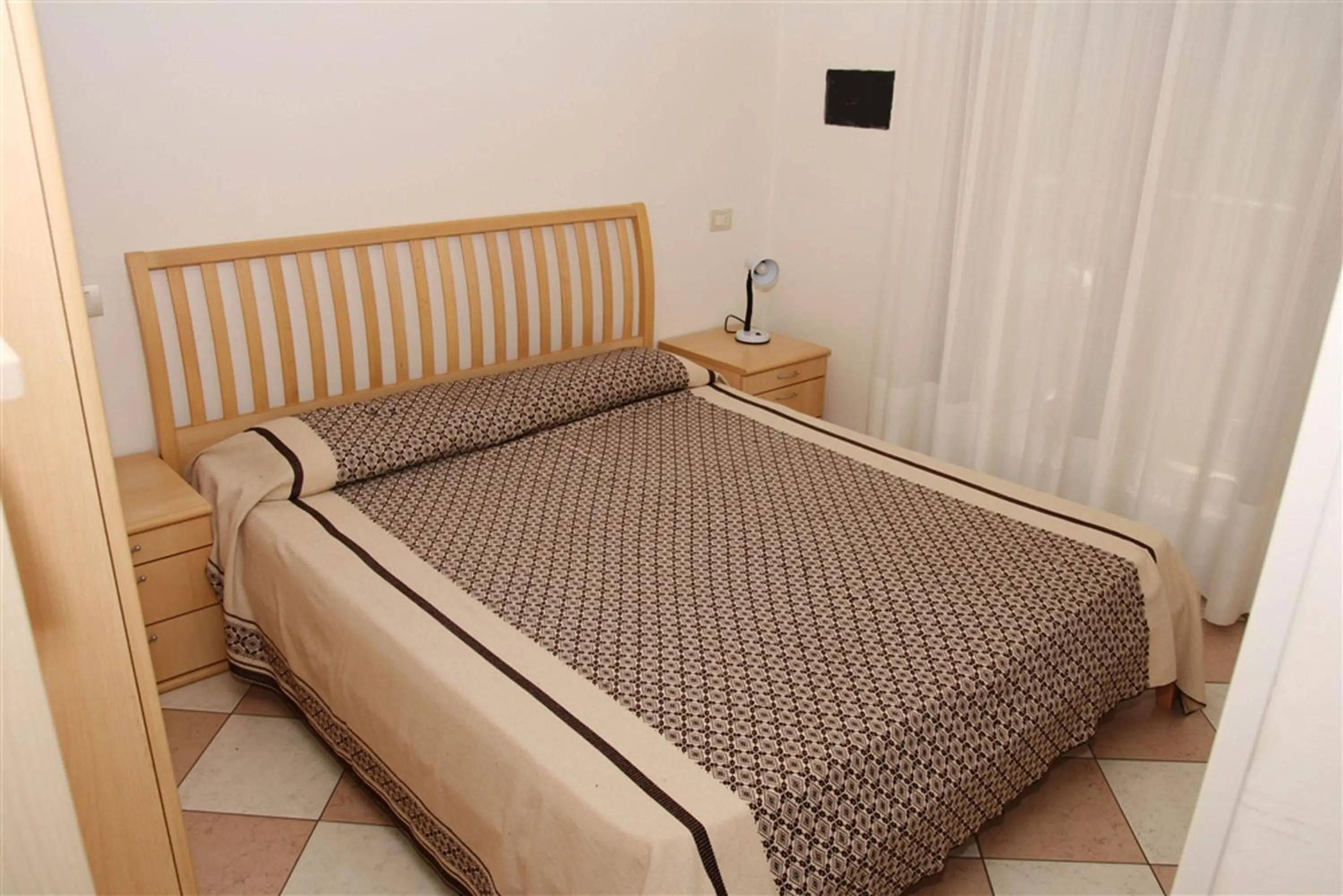 Bedroom, Bed in Family Apartments Residence Trieste