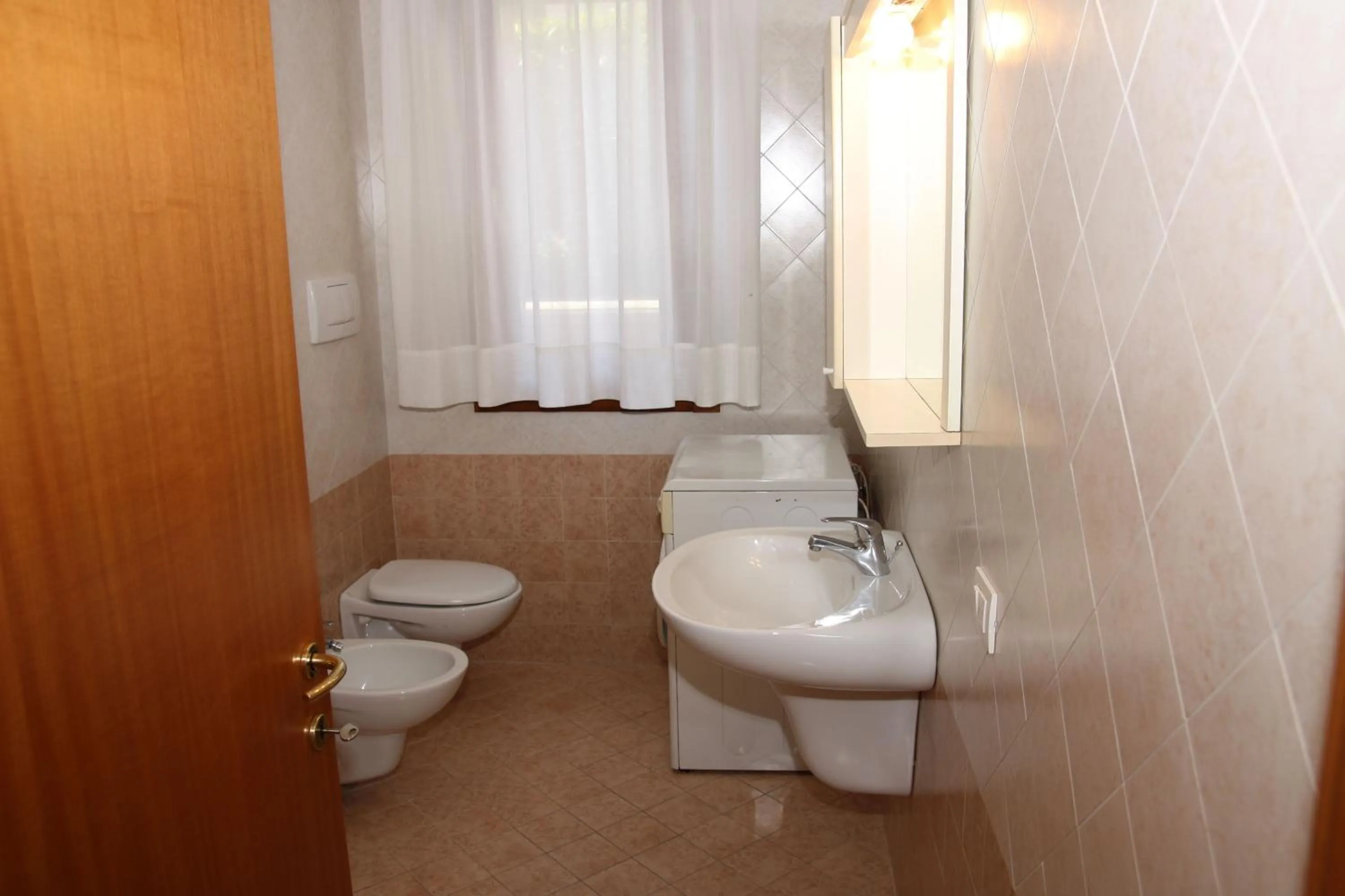 Toilet in Family Apartments Residence Trieste