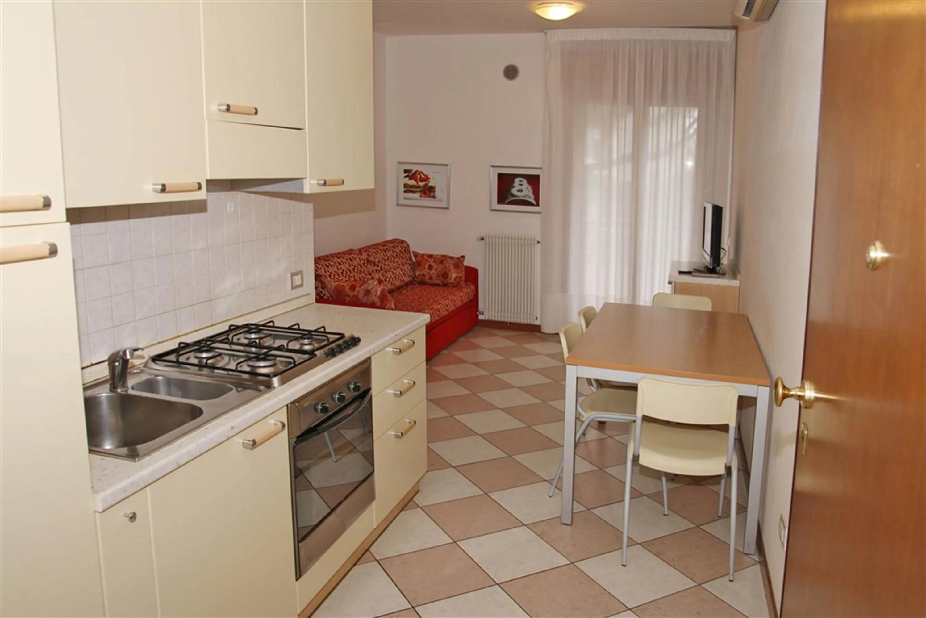 Kitchen or kitchenette in Family Apartments Residence Trieste