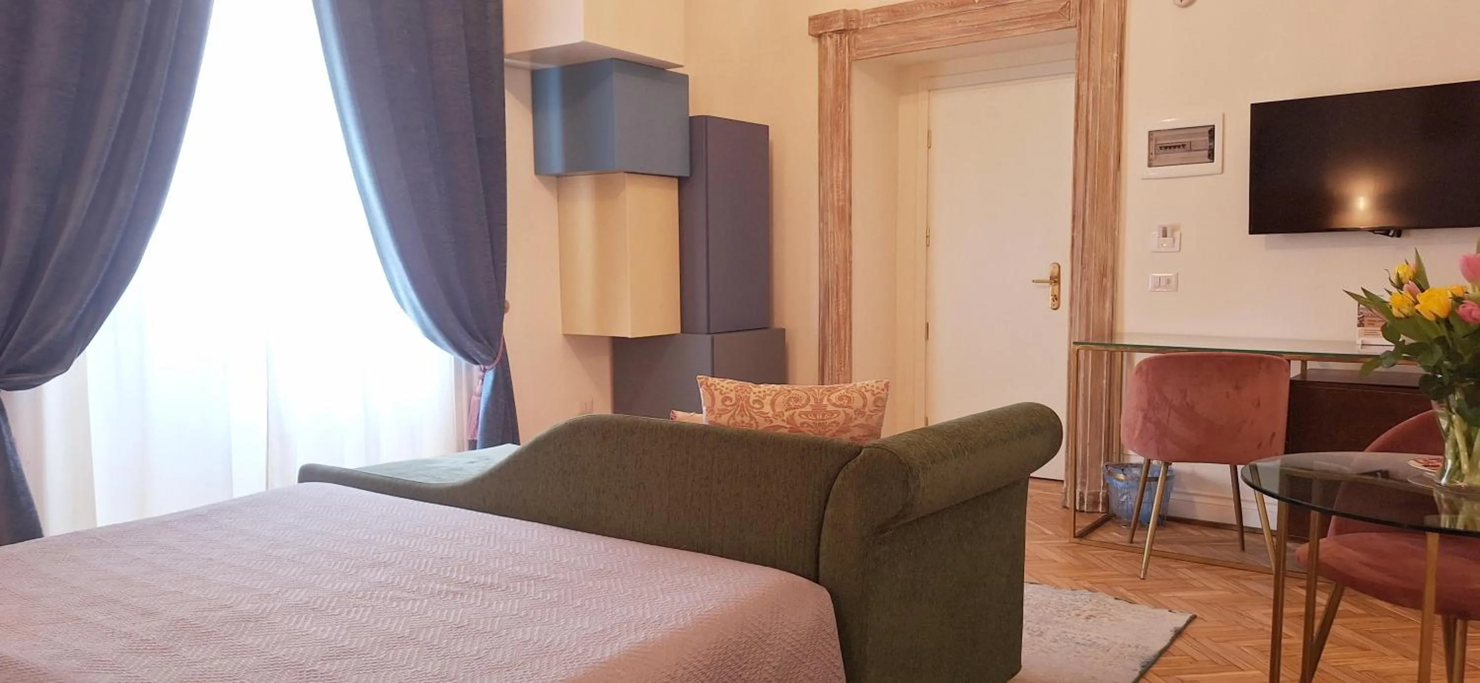 Living room, Bed in Ingrami Suites and Spa