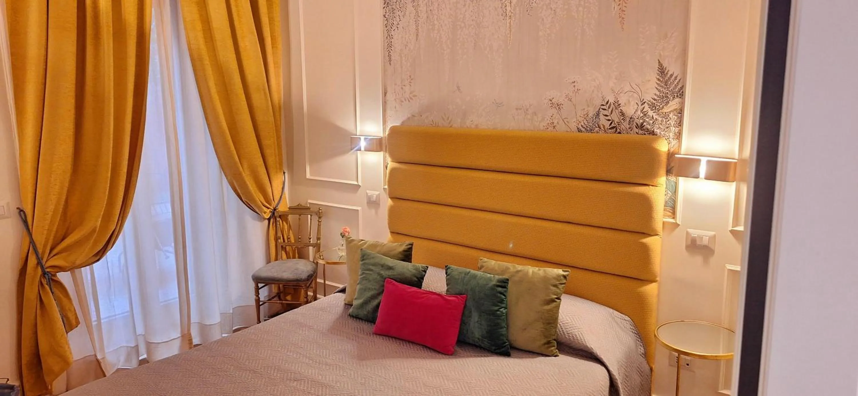 Bed in Ingrami Suites and Spa