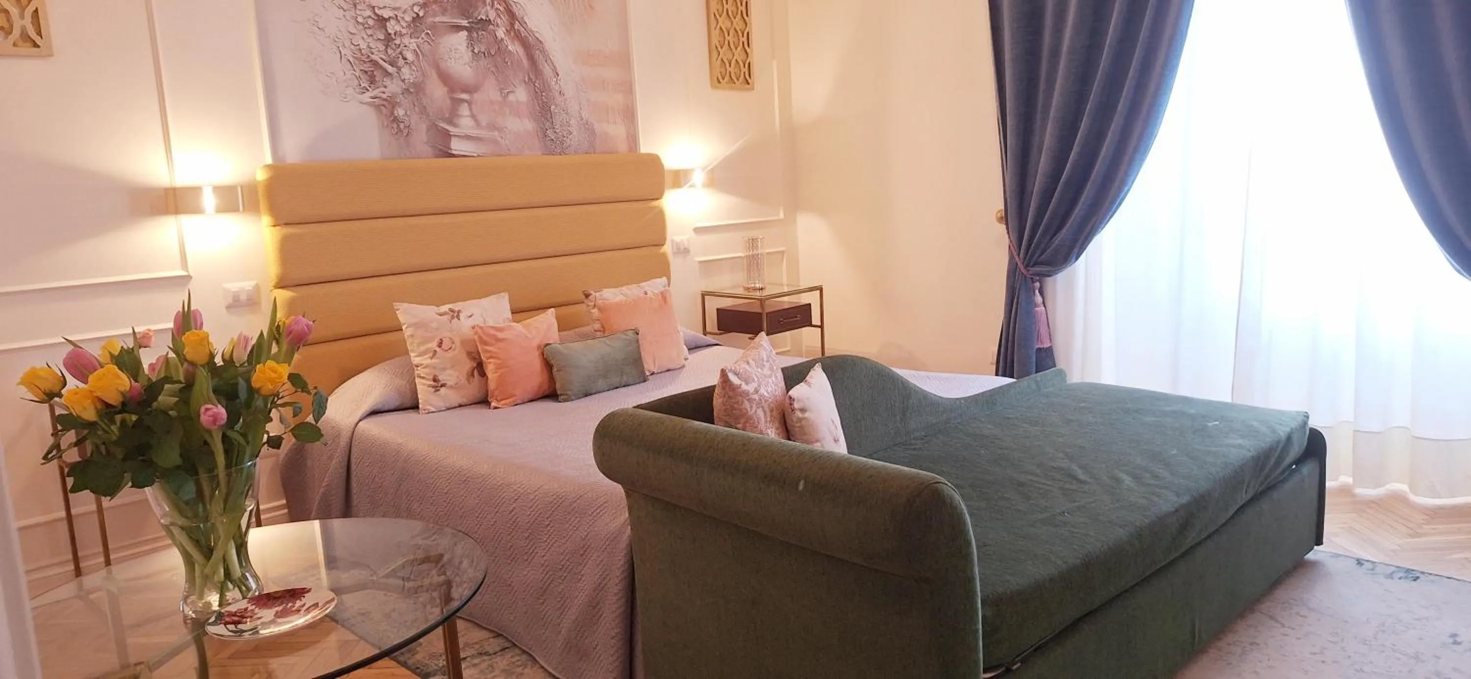 Bed in Ingrami Suites and Spa