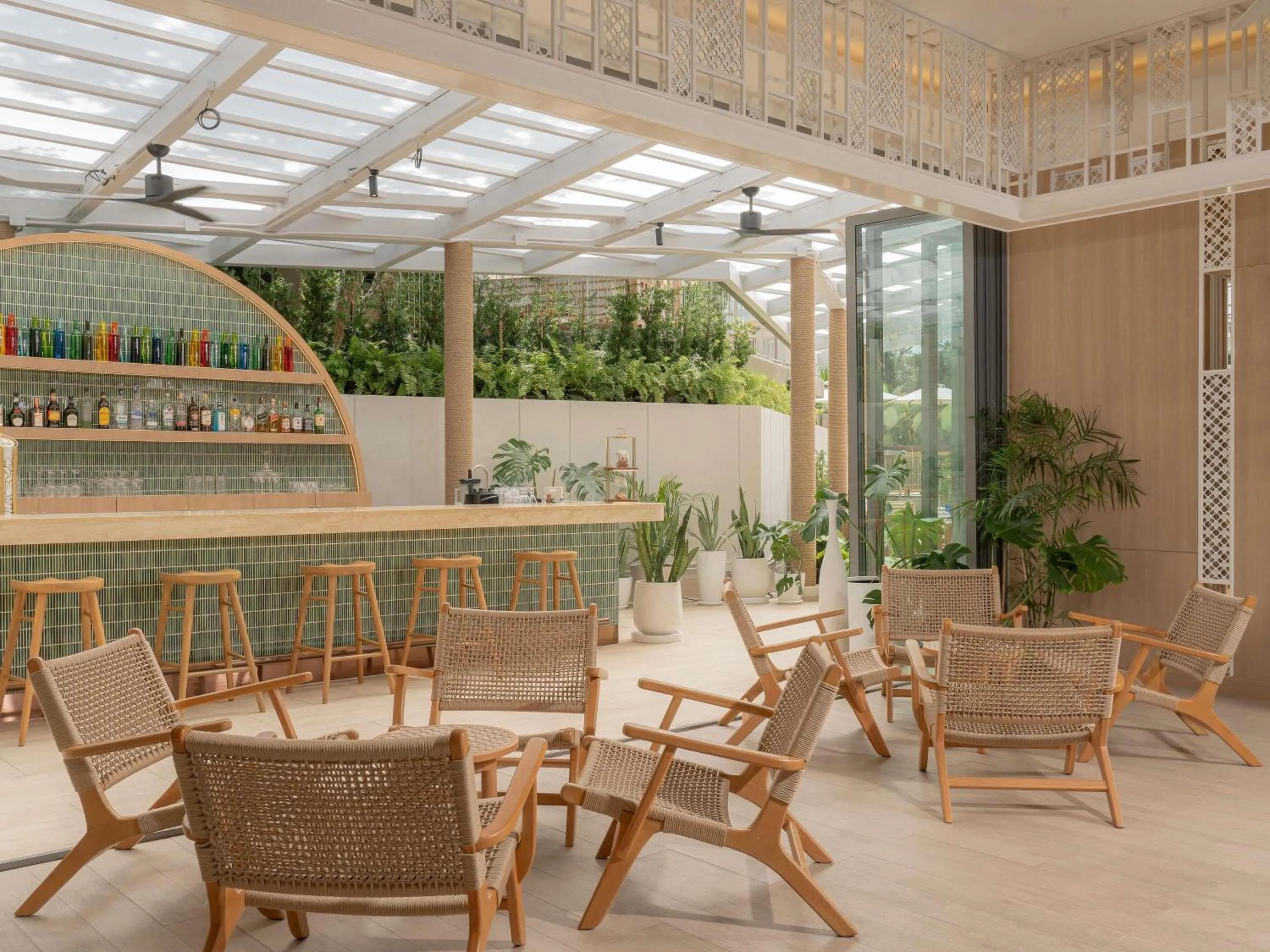 Lounge or bar in Andaman Beach Hotel Phuket - Handwritten Collection