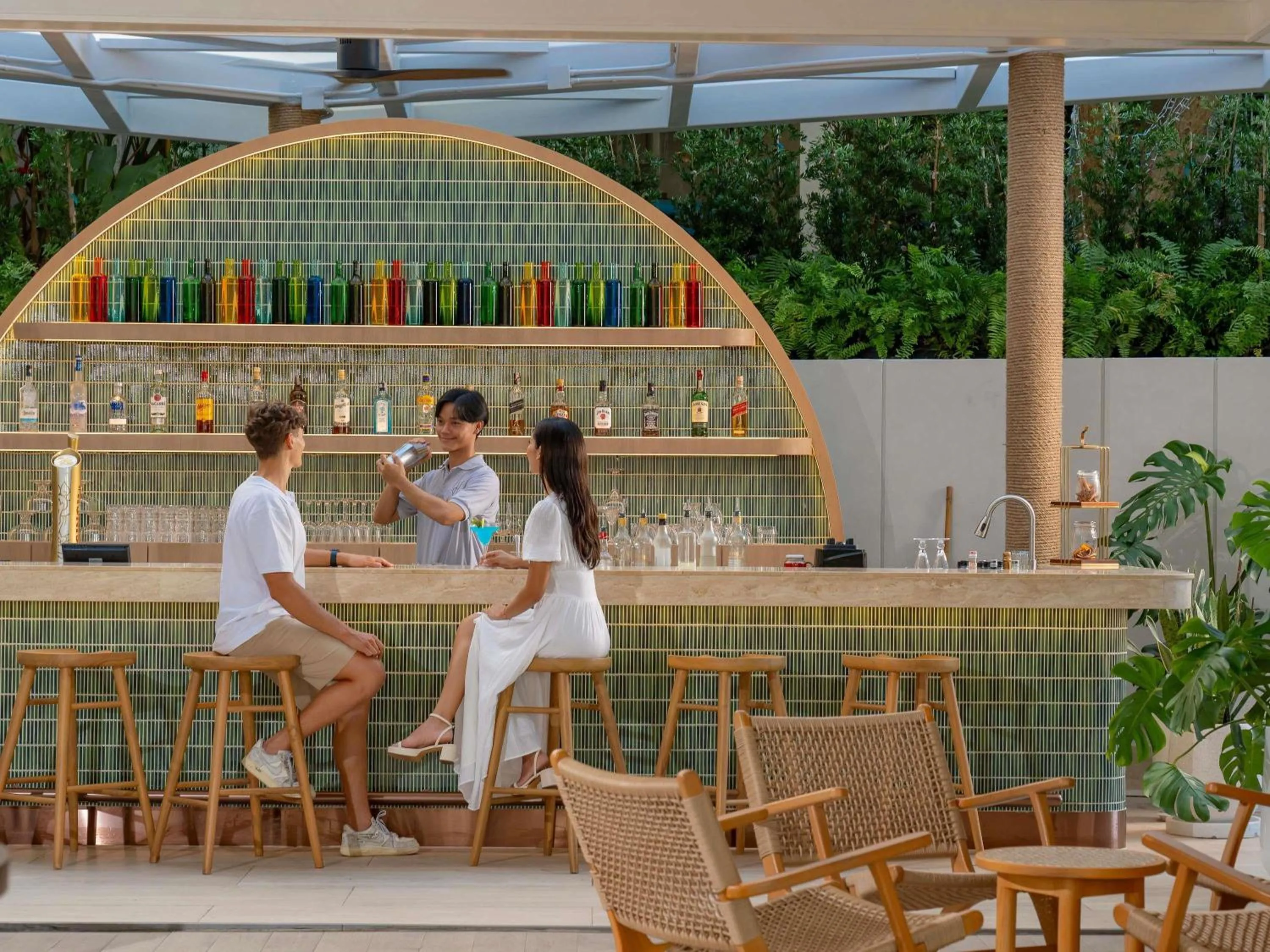 Lounge or bar in Andaman Beach Hotel Phuket - Handwritten Collection