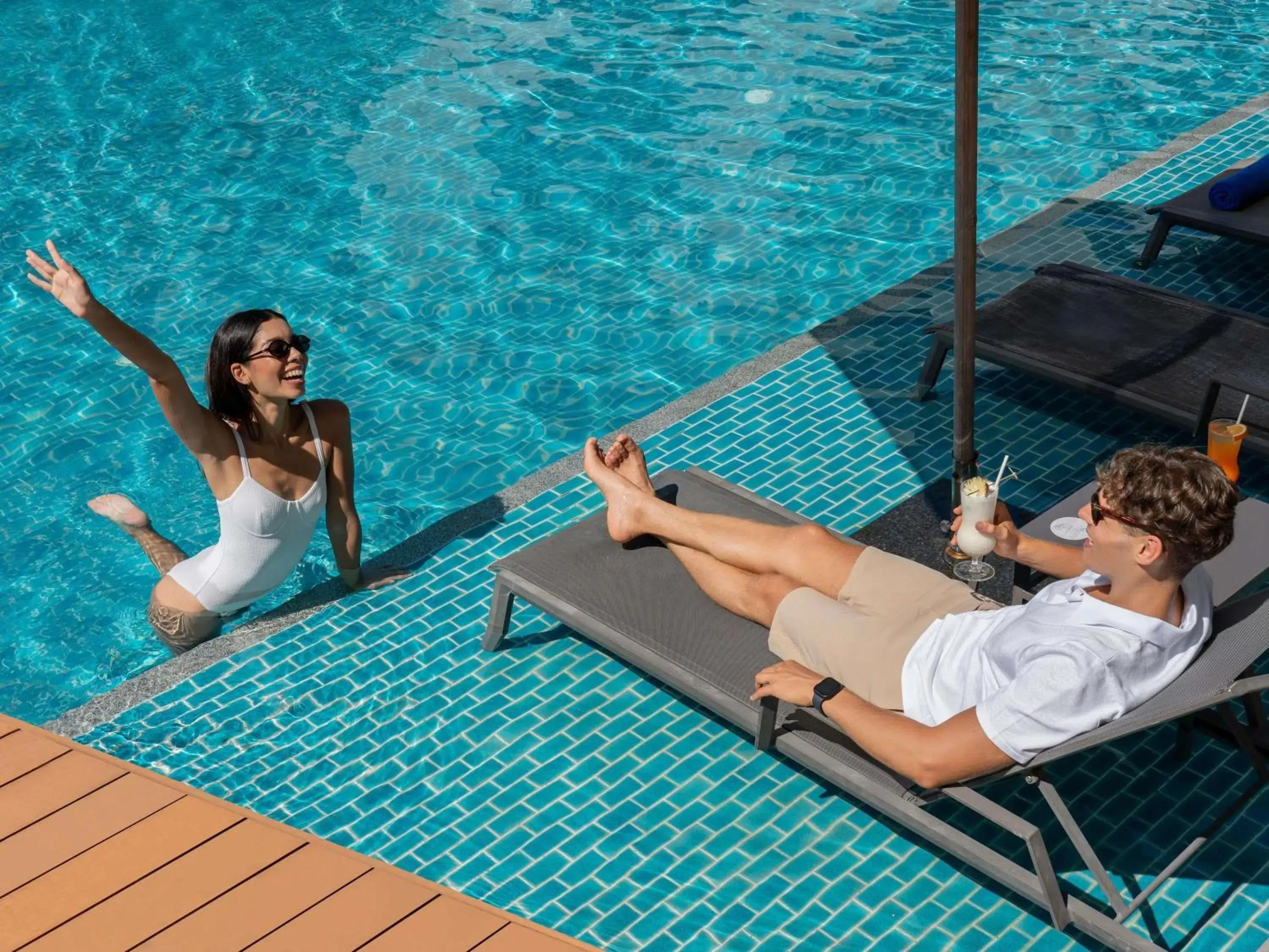 Pool view in Andaman Beach Hotel Phuket - Handwritten Collection Pool view in Andaman Beach Hotel Phuket - Handwritten Collection