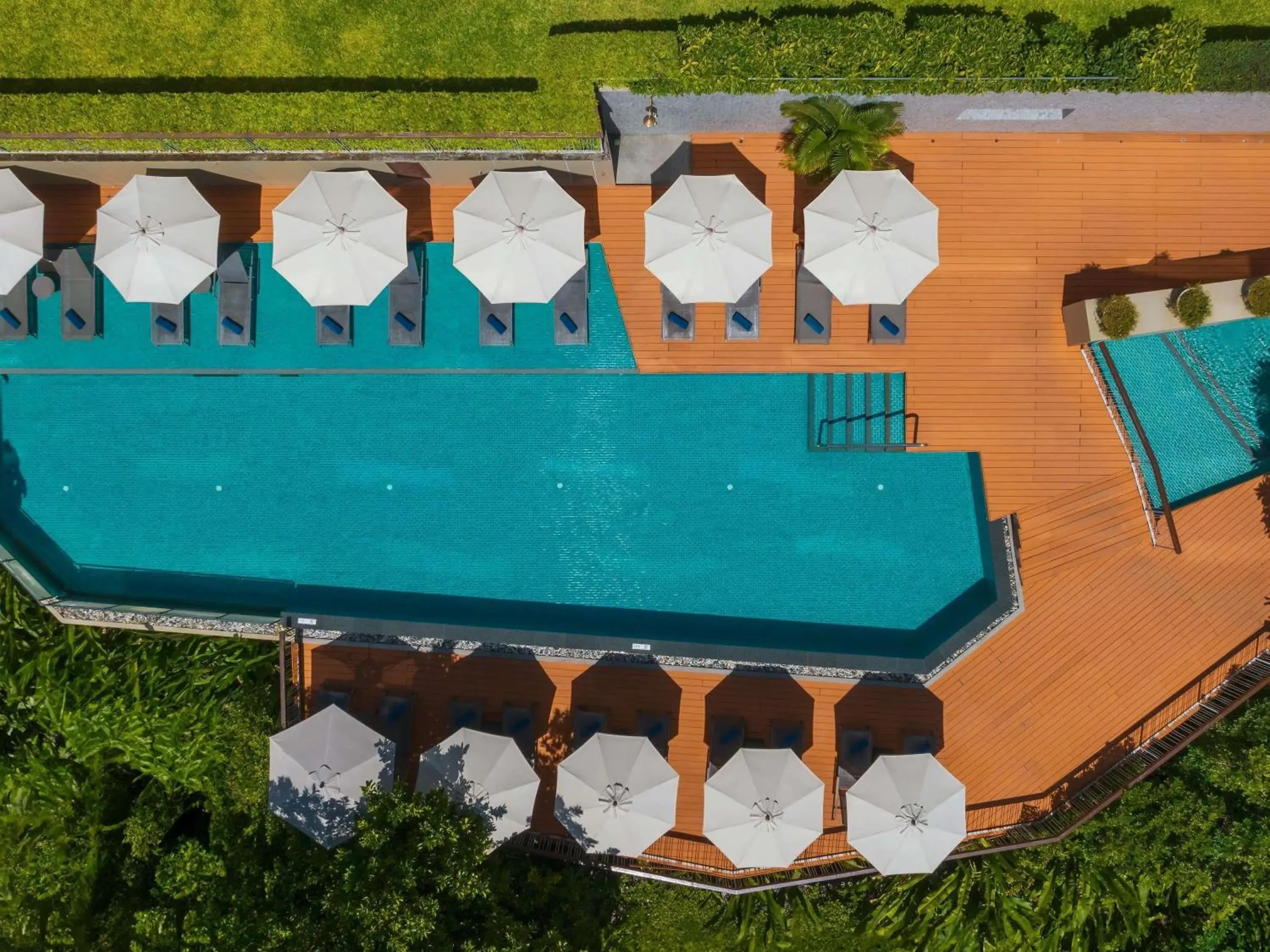 Pool view in Andaman Beach Hotel Phuket - Handwritten Collection Pool view in Andaman Beach Hotel Phuket - Handwritten Collection