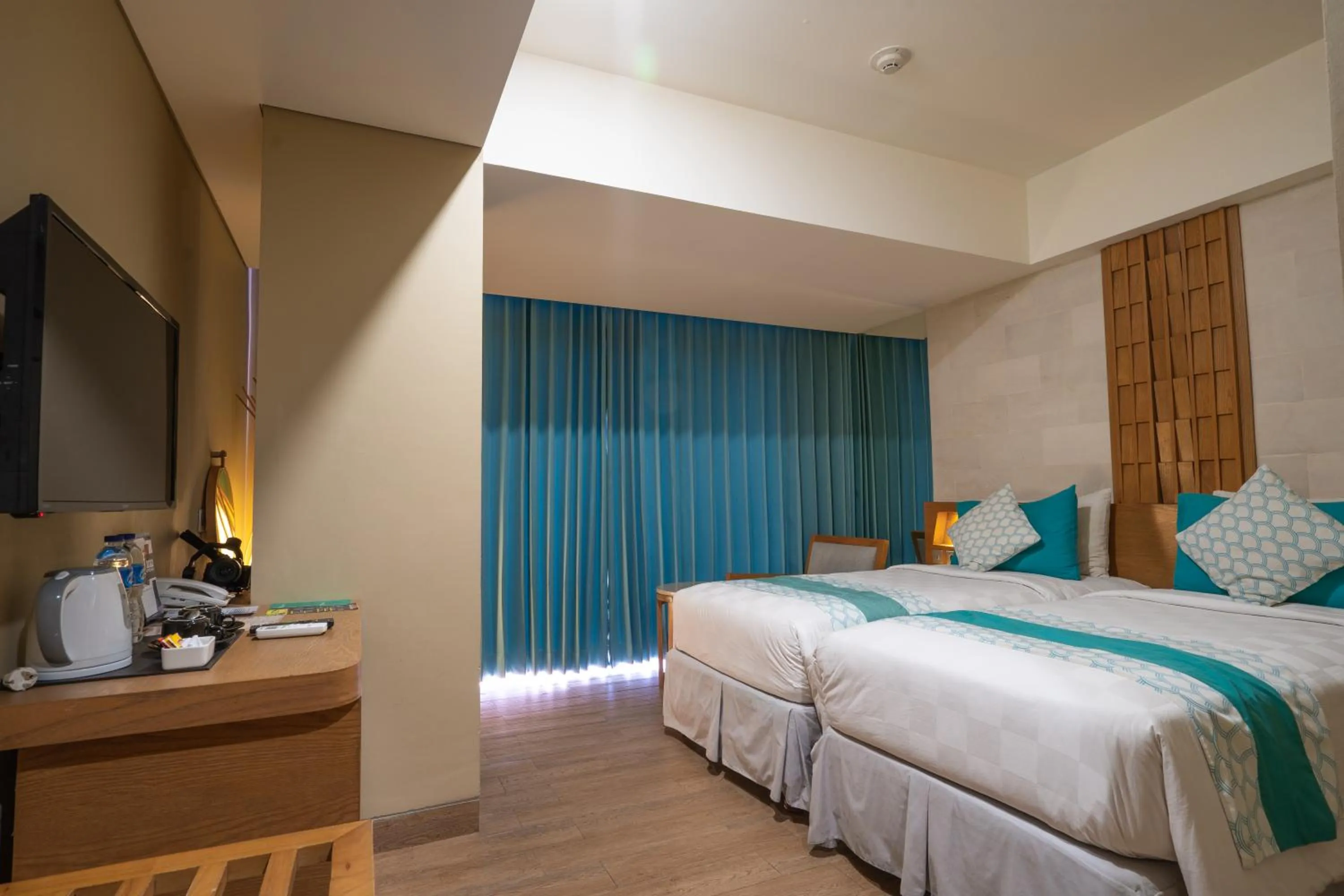 Bed in Bedrock Hotel Kuta