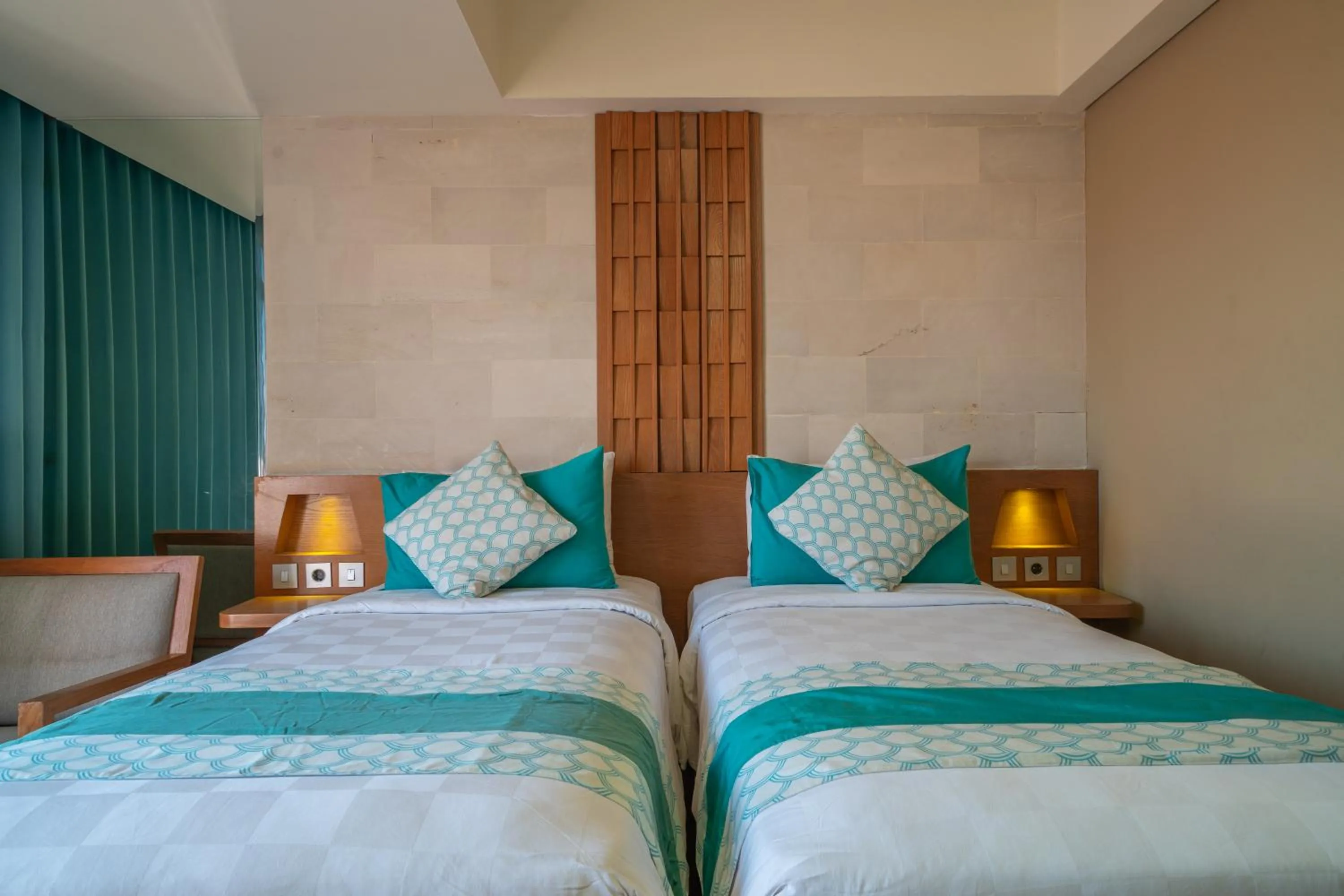 Property building, Bed in Bedrock Hotel Kuta