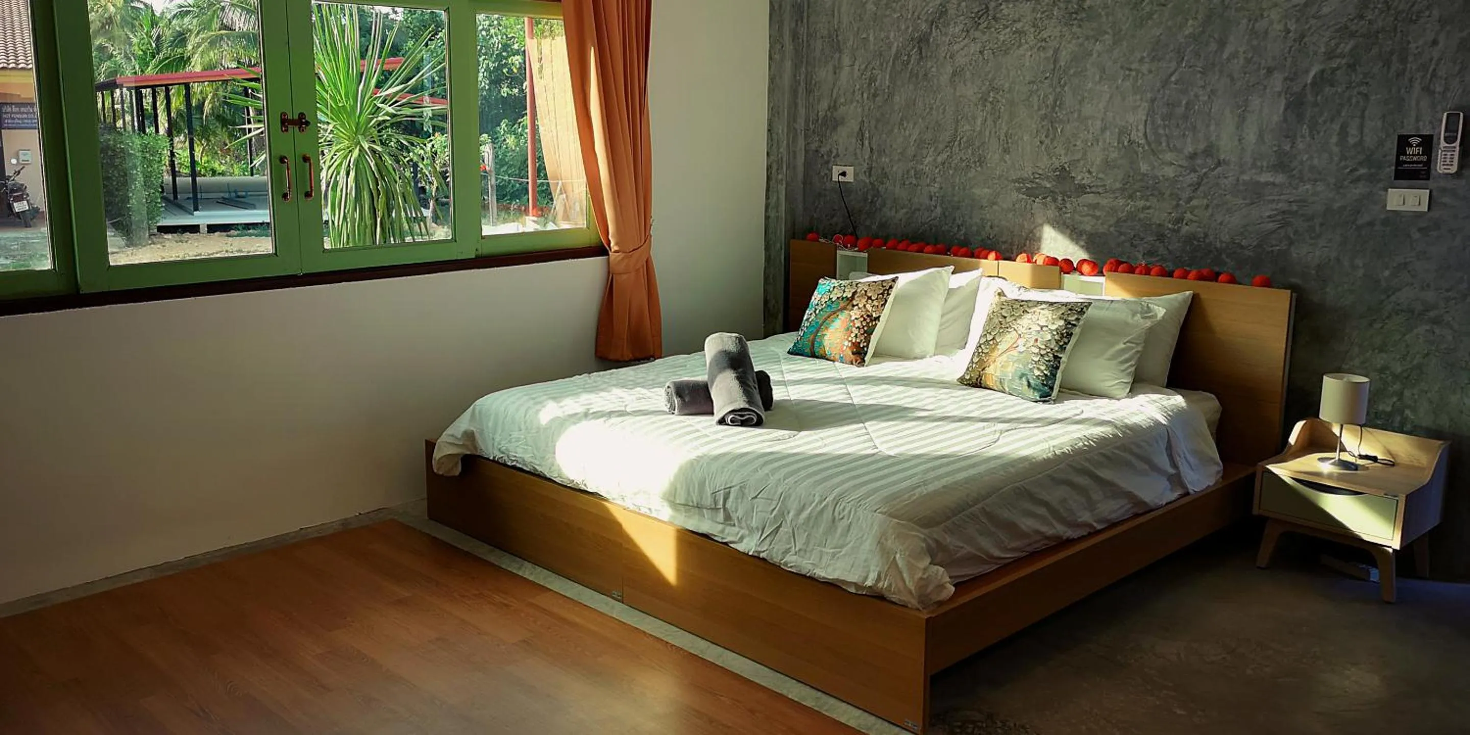 Bed in Tonmai Suites