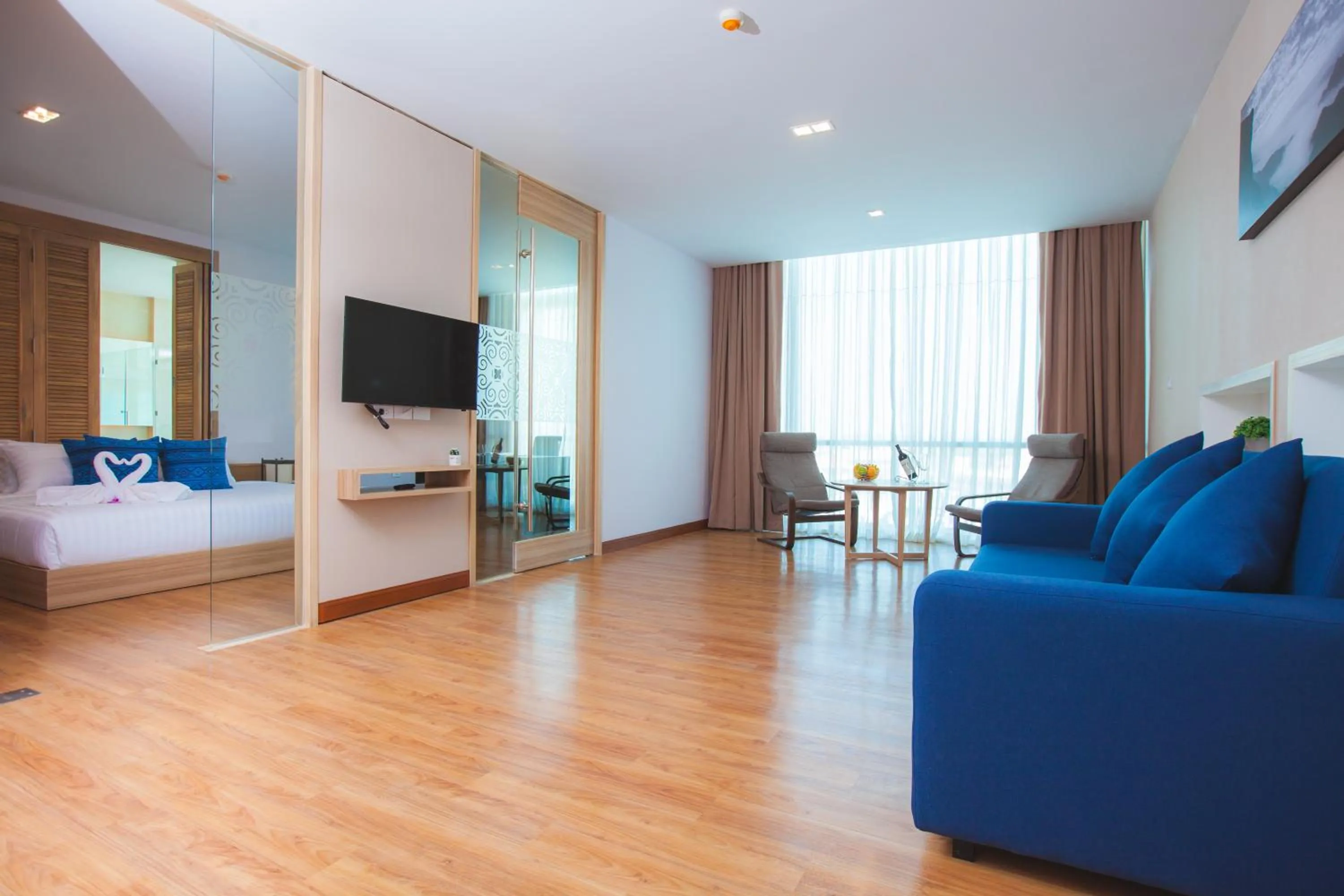 Living room, Bed in Grand Vista Hotel Chiangrai