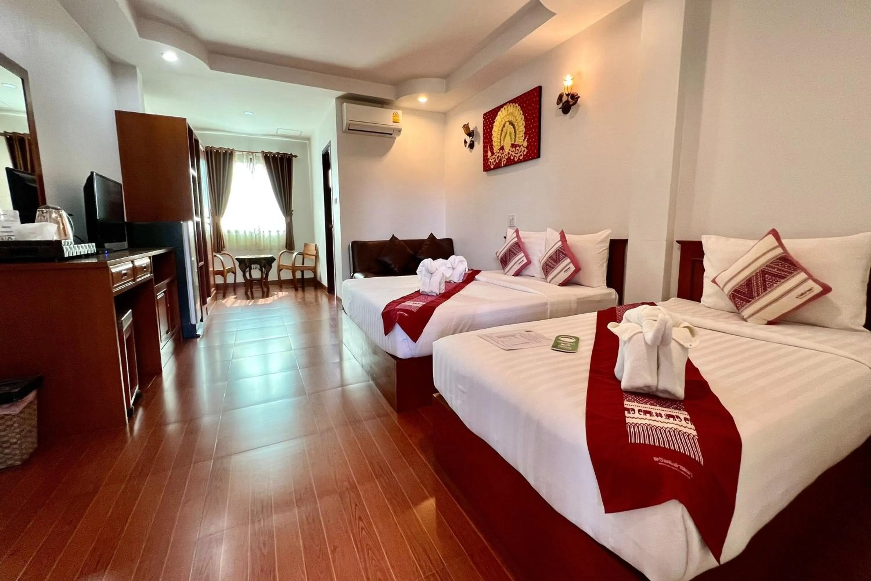 Photo of the whole room, Bed in Sawadeelanna Hotel