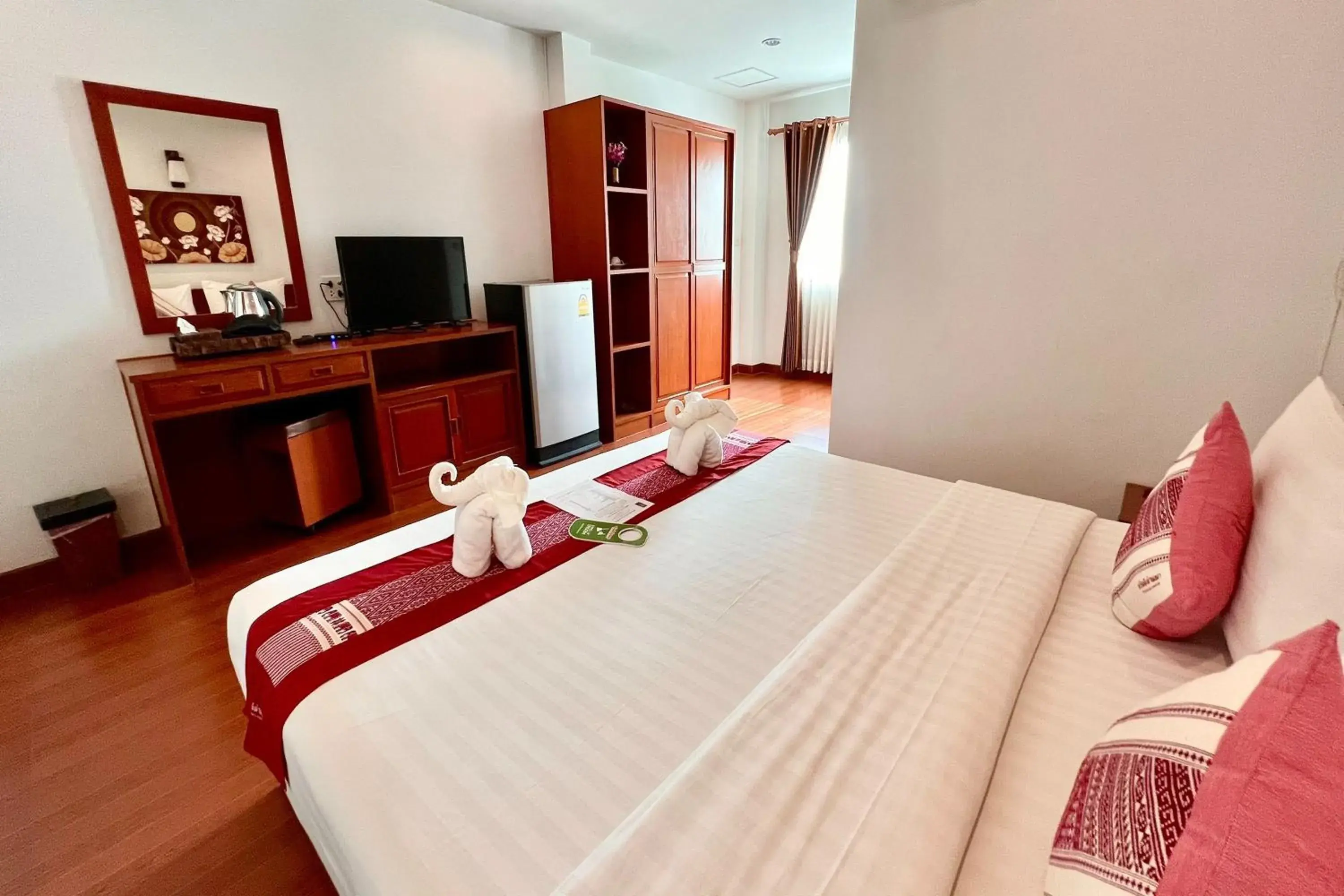 Bed in Sawadeelanna Hotel Bed in Sawadeelanna Hotel